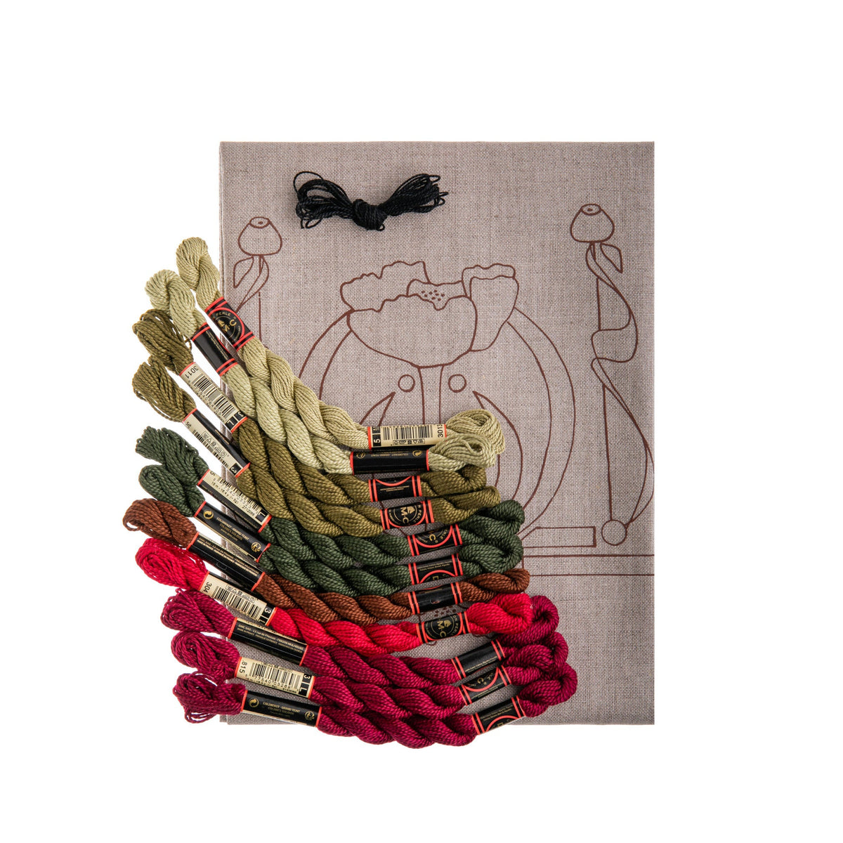 Set of embroidery threads in various colors with a design on fabric in the background.