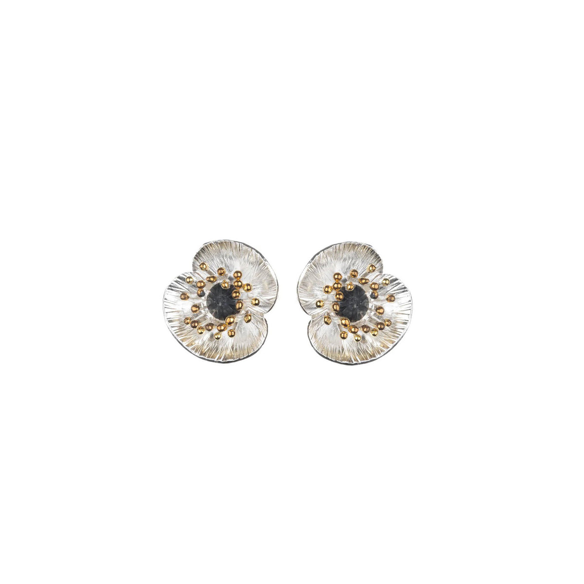 Pair of floral poppy earrings with gold and silver details on a white background