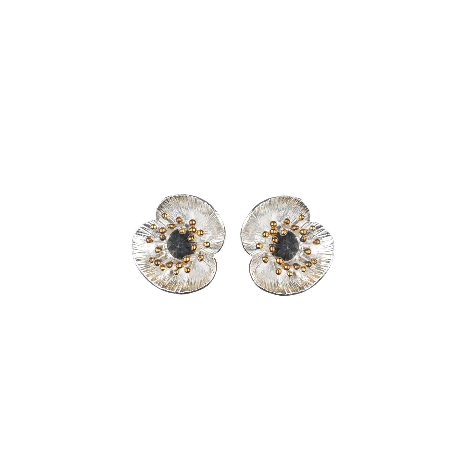 Pair of floral poppy earrings with gold and silver details on a white background