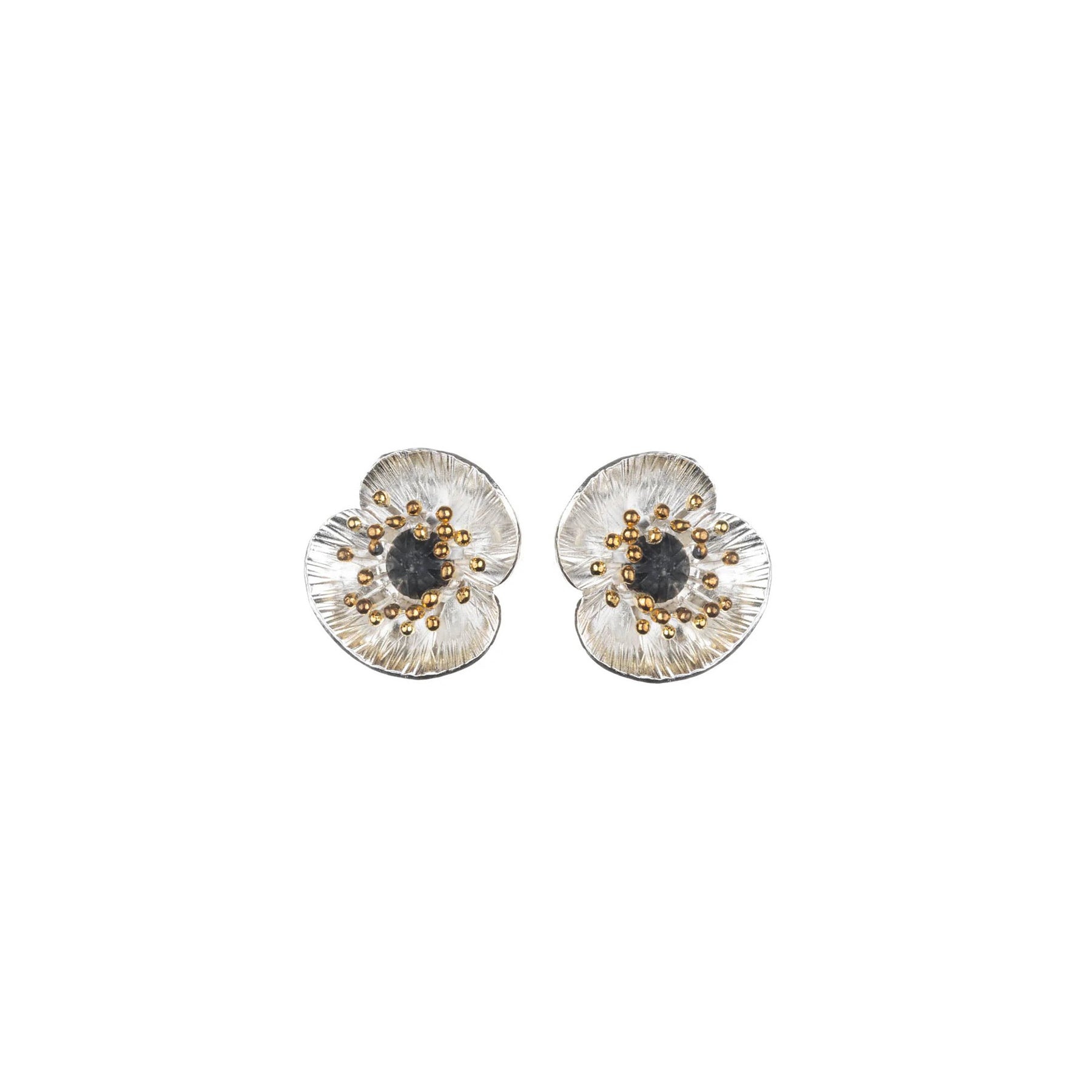 Pair of floral poppy earrings with gold and silver details on a white background
