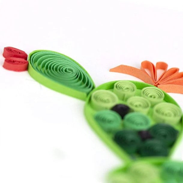 Quilled cactus greeting card on a white background with a green border