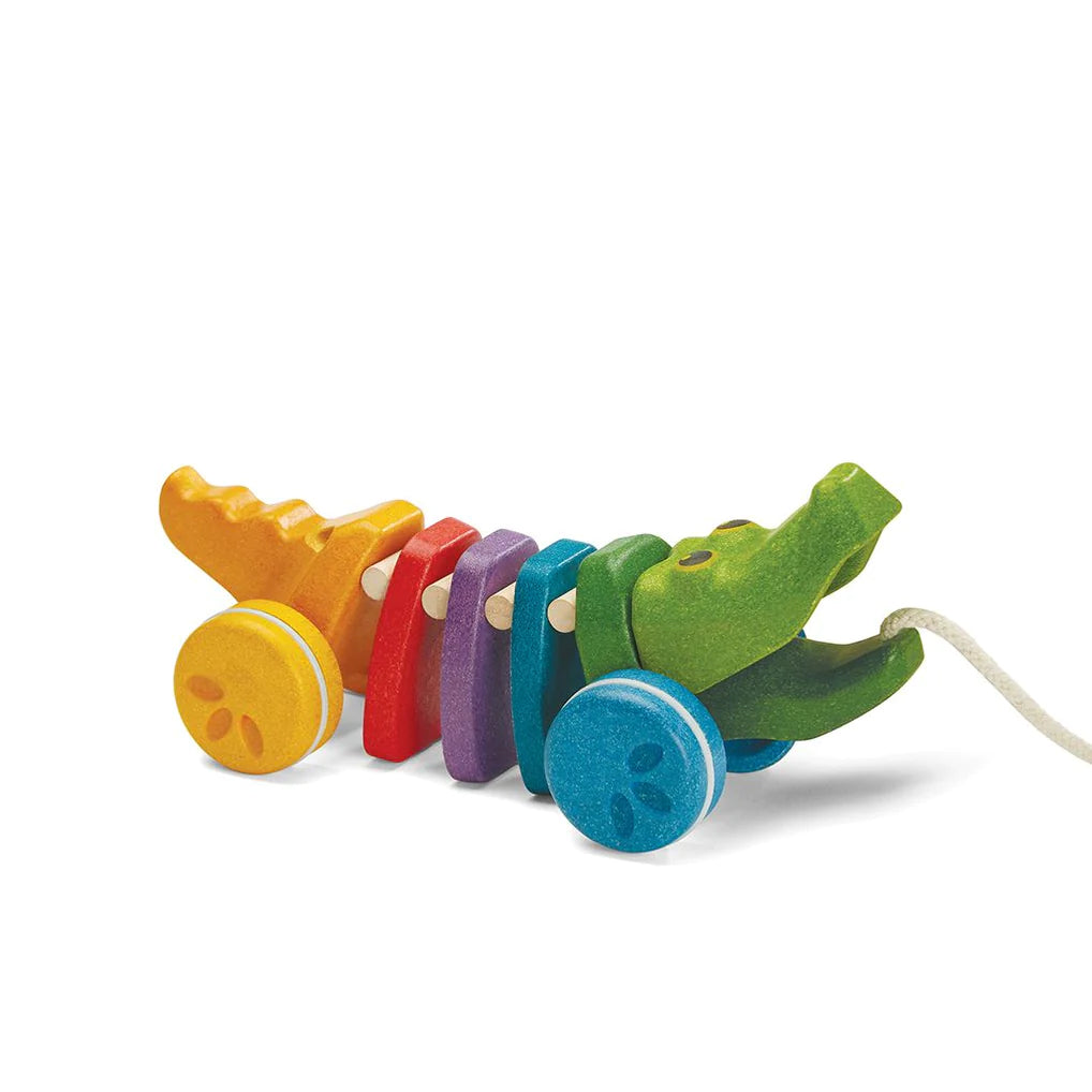 When children pull the Alligator, its head and tail move up and down – making a fun click-clack sound. Designed using PlanWood™, a unique material that utilizes surplus sawdust and wood scraps to create a sustainable, flexible wooden material. 8.86 in X 3.74 in X 3.74 in Age: 12 months +.