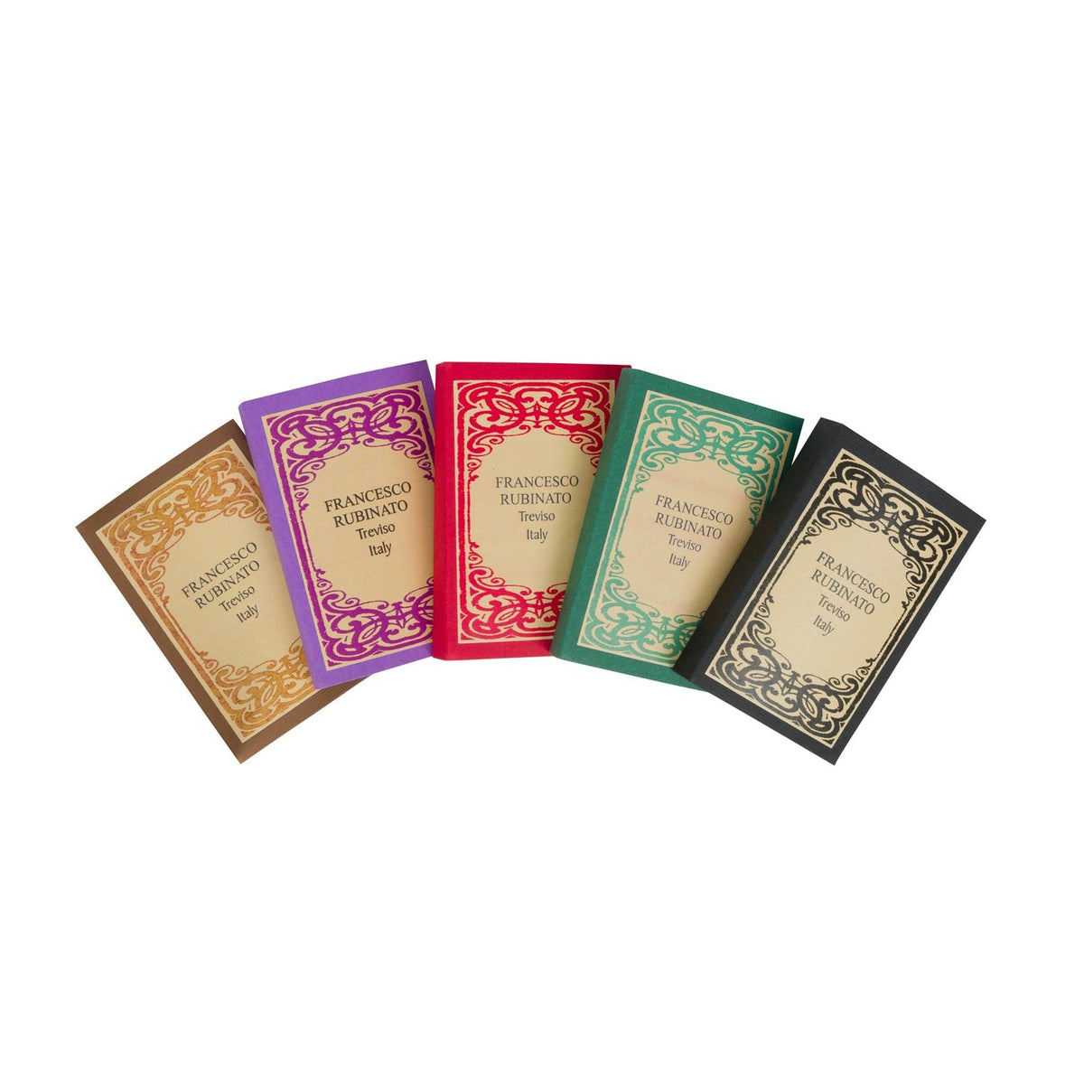 Five colorful books with decorative covers on a white background