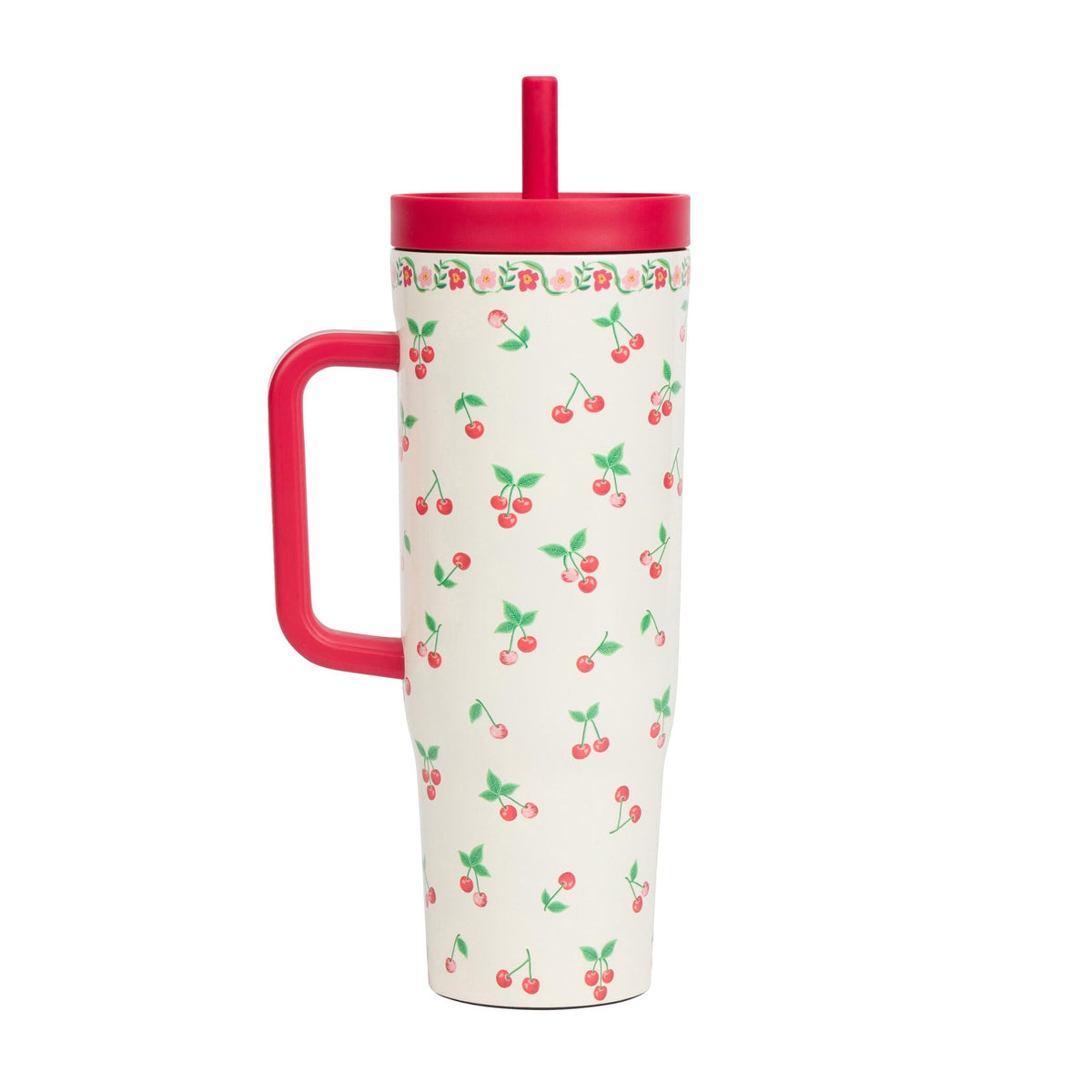 Tumbler with cherry pattern and pink handle and lid on a white background