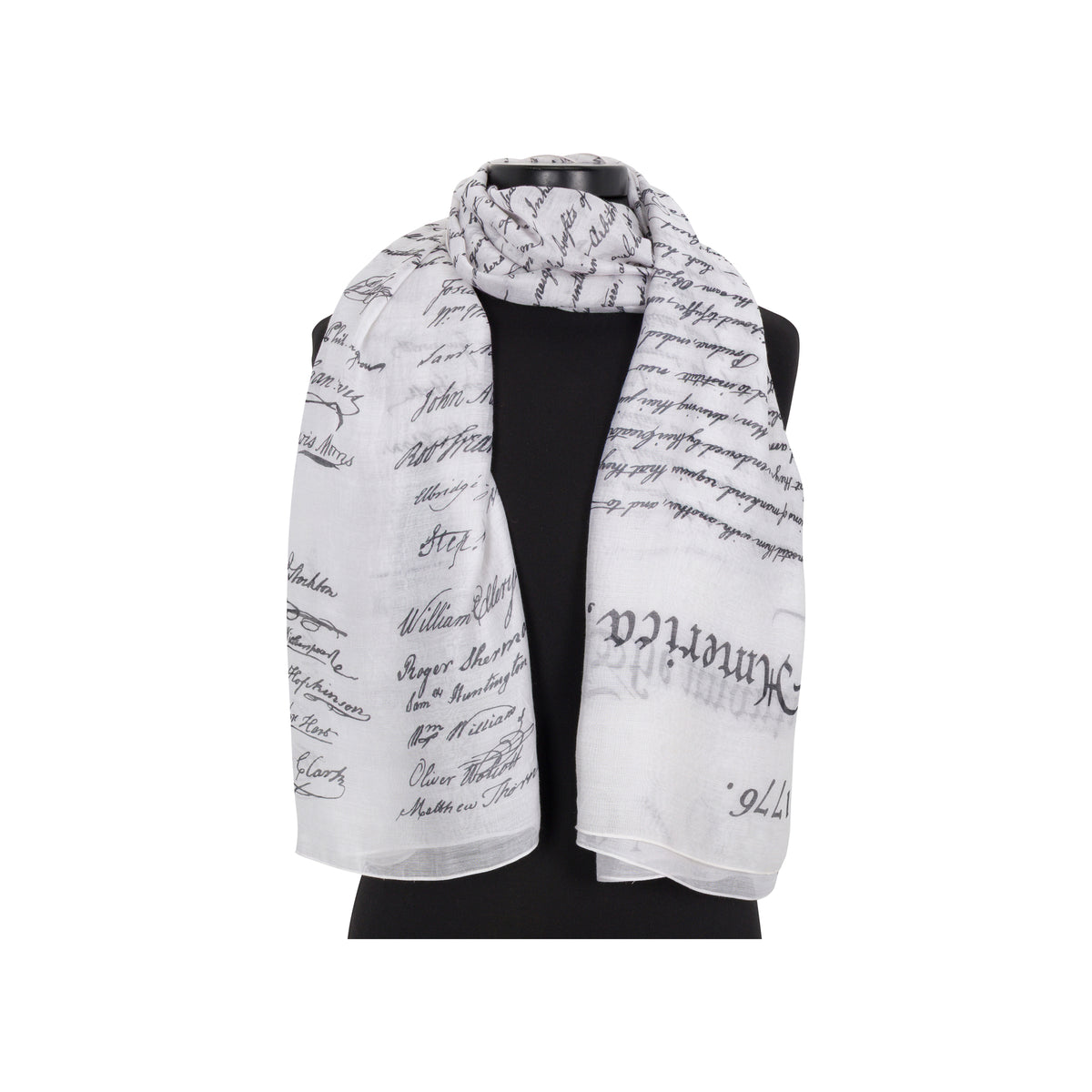 White scarf with black text on a mannequin against a white background