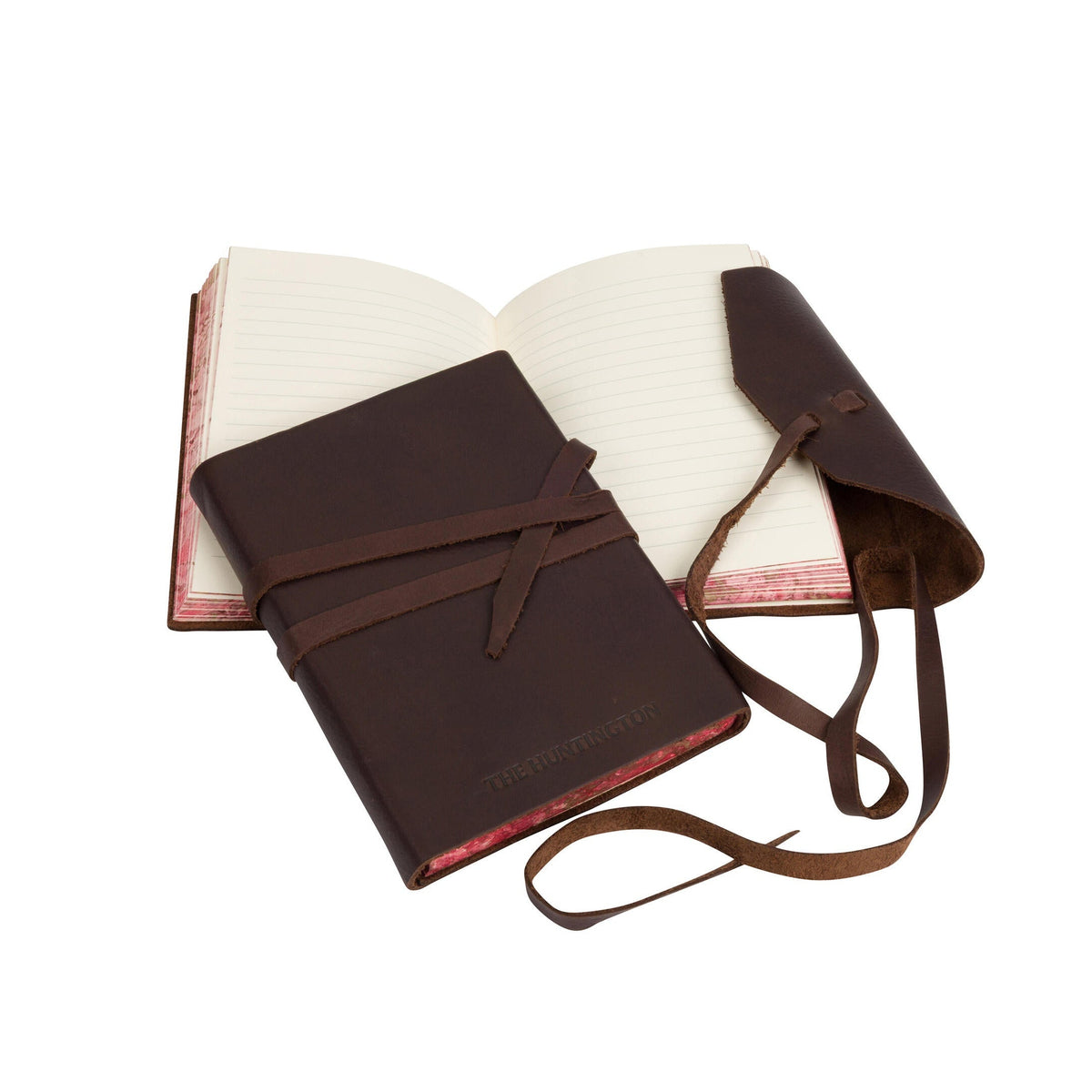 Brown leather-bound book with a strap on a white background