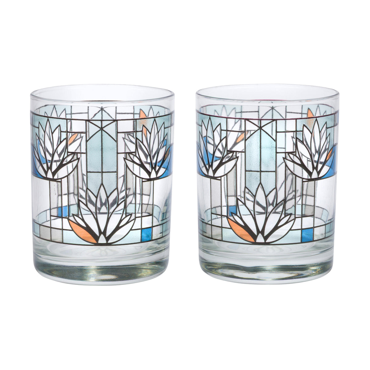 Two glass tumblers with decorative floral patterns on a white background