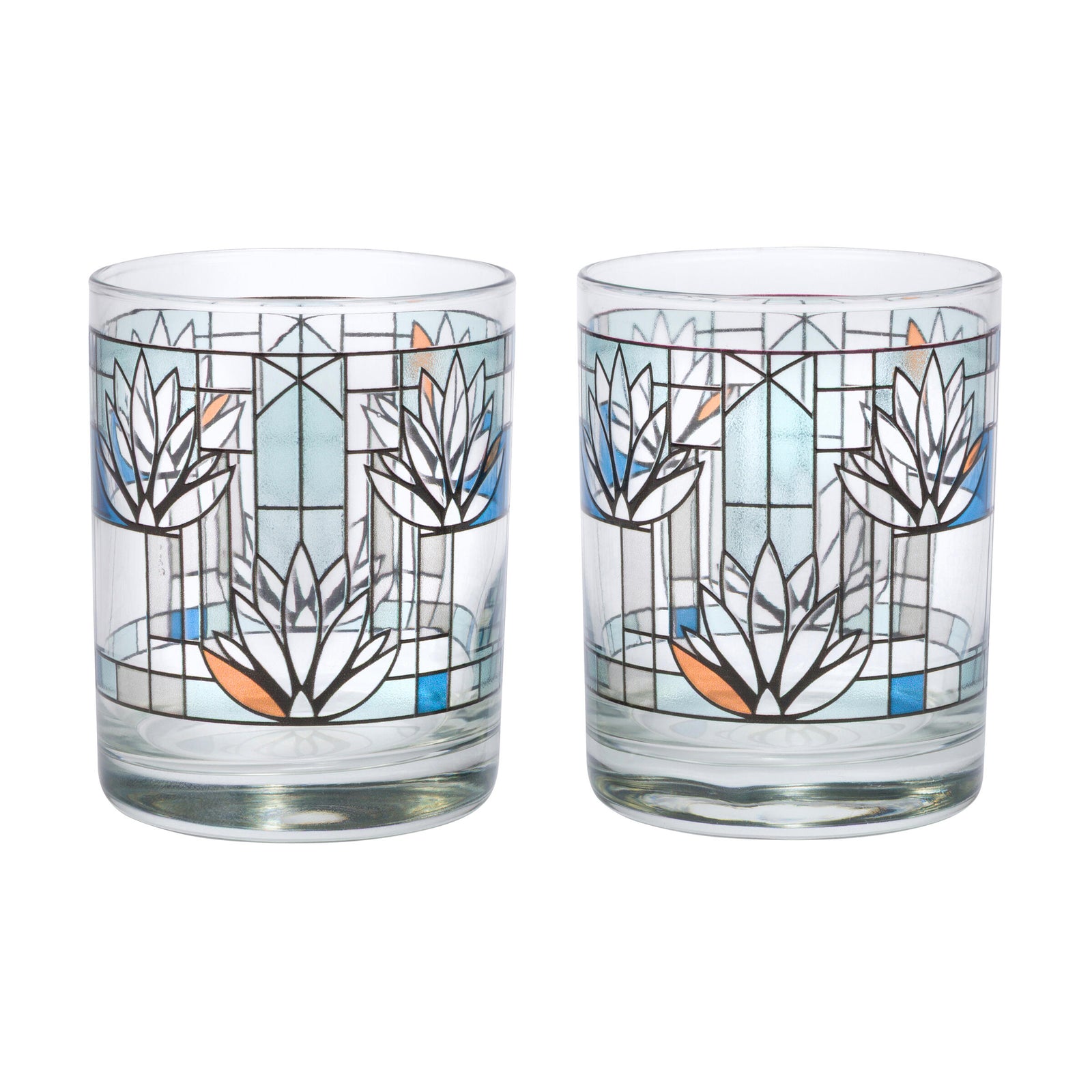 Two glass tumblers with decorative floral patterns on a white background
