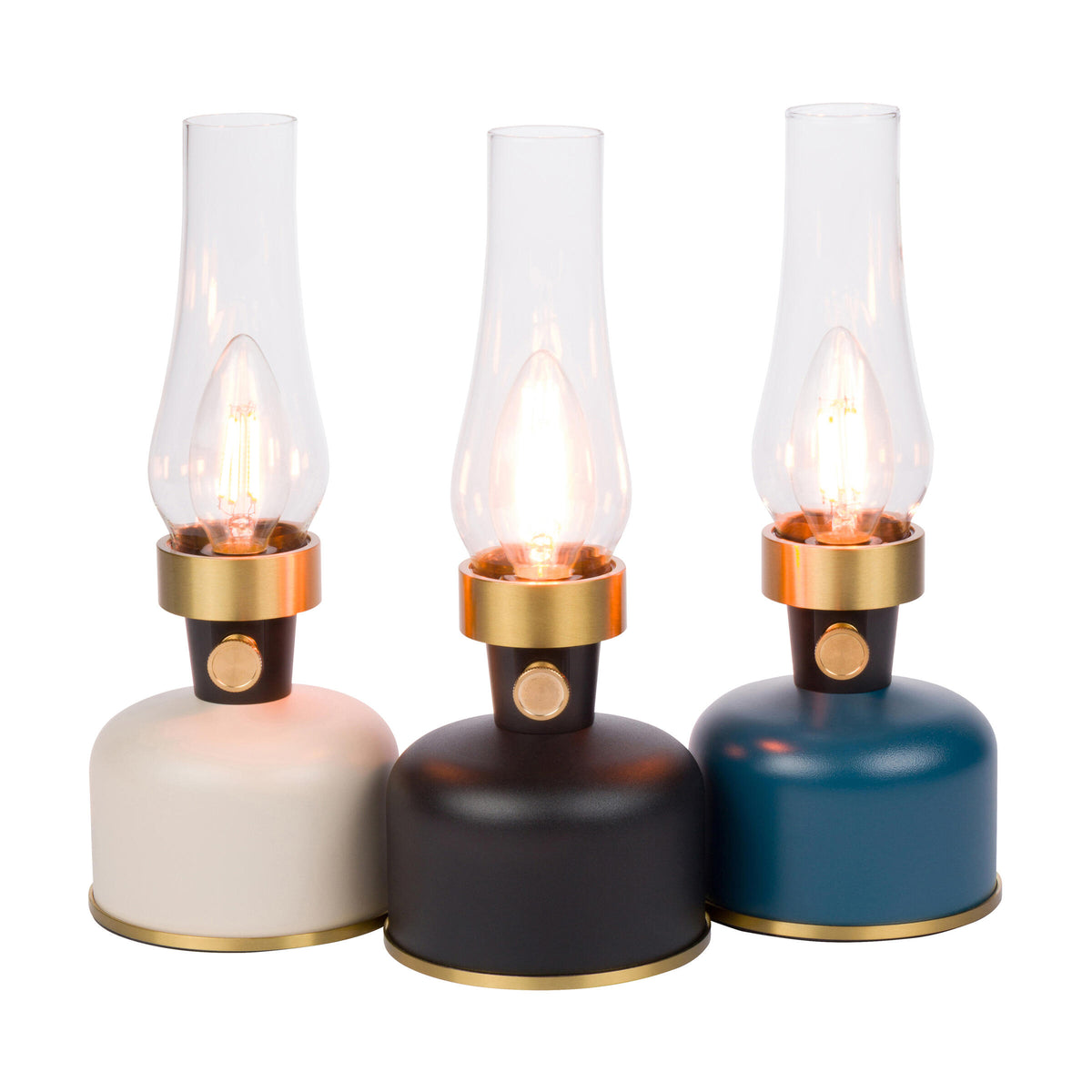 Three decorative lamps with clear glass shades and gold bases on a white background