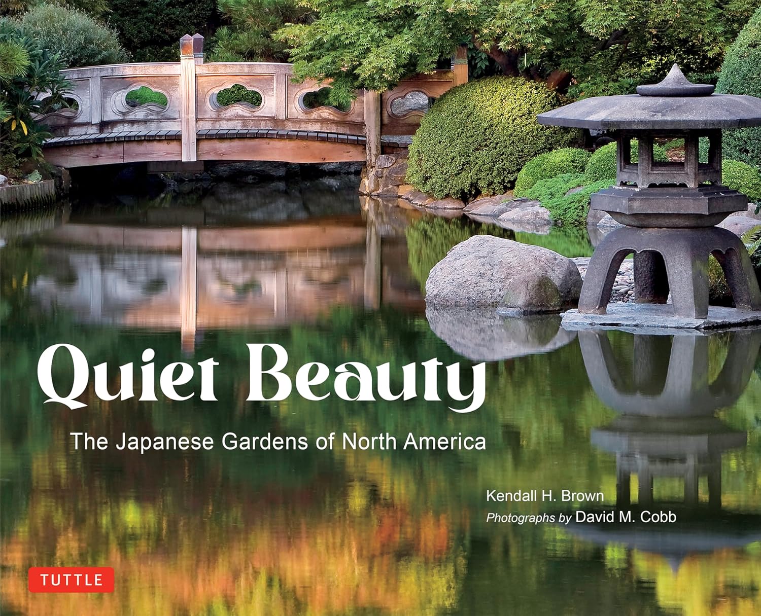 Cover of the book 'Quiet Beauty - The Japanese Gardens of North America' featuring a photograph of a Japanese garden with a bridge, pond, and lantern.