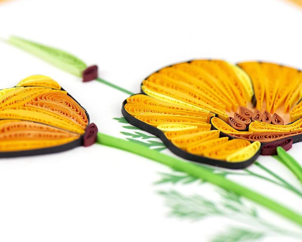 The orange poppy—also known as the California Poppy—has been a symbol of prosperity since Victorian times. This quilled greeting card features two poppies in joyful yellow and orange hues, brightening anyone’s day! Each quilled card is beautifully handmade by a highly skilled artisan and takes one hour to create. It makes a great keepsake or frameable art piece for its recipient. Dimensions: 6" x 6"