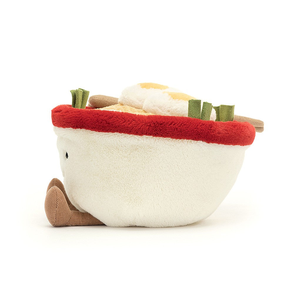 Amuseable Ramen is full of kawaii charm, from the cream-and-red bowl to the suedette chopsticks. Filled with wavy cord noodles, suedette spring onions and fluffy boiled eggs, as well as a pink embroidered fish cake, this dish is a wish come true. Suitable from birth. Dimensions: 7" x 5".