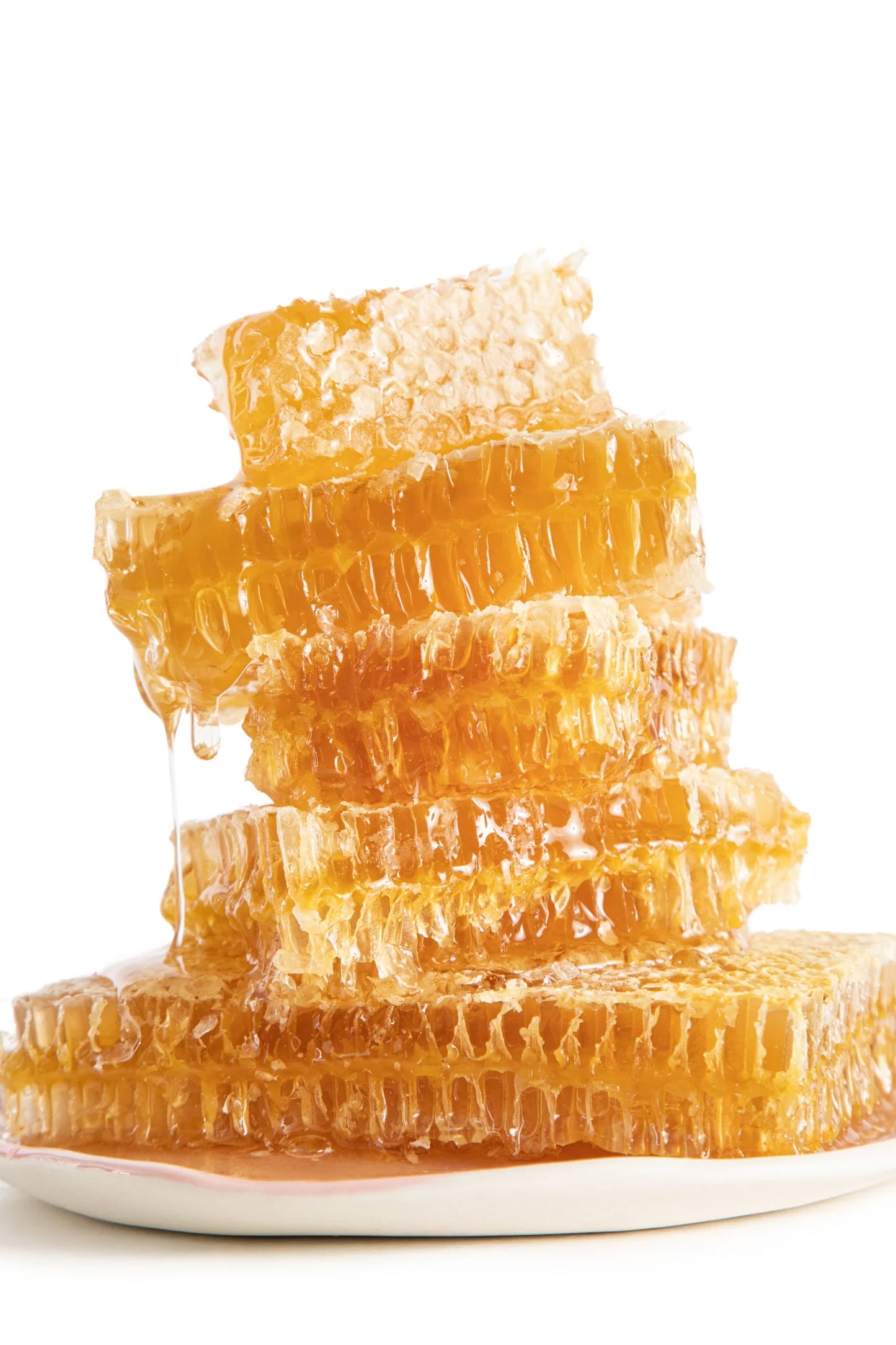 Enjoy honey in its most natural state with a gorgeous hunk of raw honeycomb sourced from Hungary. Spread it on warm bread, plop into salads, or just dig in with a spoon—yes, you can eat the wax! Flavor profile: Light and sweet with hints of vanilla. 100% raw honeycomb. 100% edible. KSA certified. Kosher. 5.6 oz. 