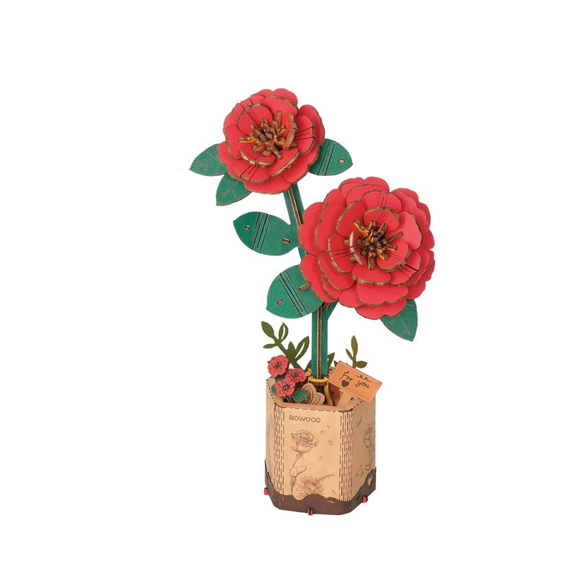 Perfect for both beginners and seasoned hobbyists, this delightful Camelia puzzle is designed to be easily assembled within a mere hour and a half, making it an ideal project for a rainy afternoon. Upon completion, these flower puzzles make for a beautiful display piece. Assembled size: 4.53" x 2.56" x 8.07" Age  14+.