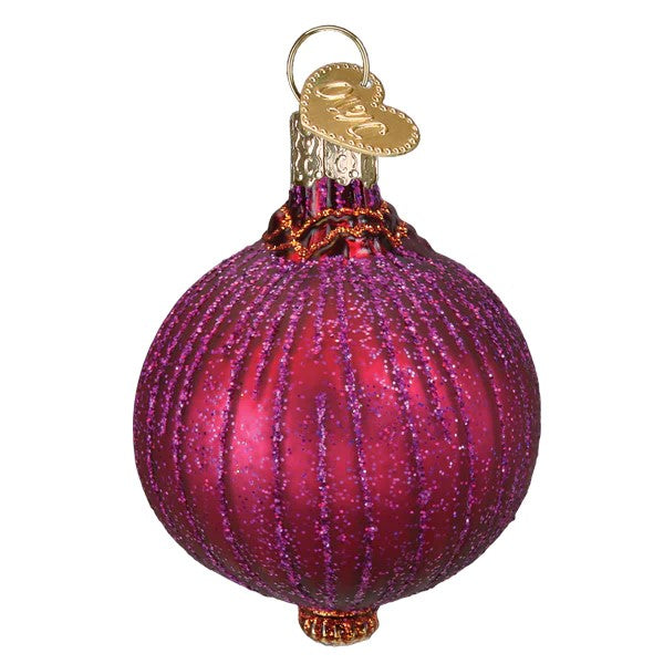 Decorative glass sliced red onion ornament on a white background