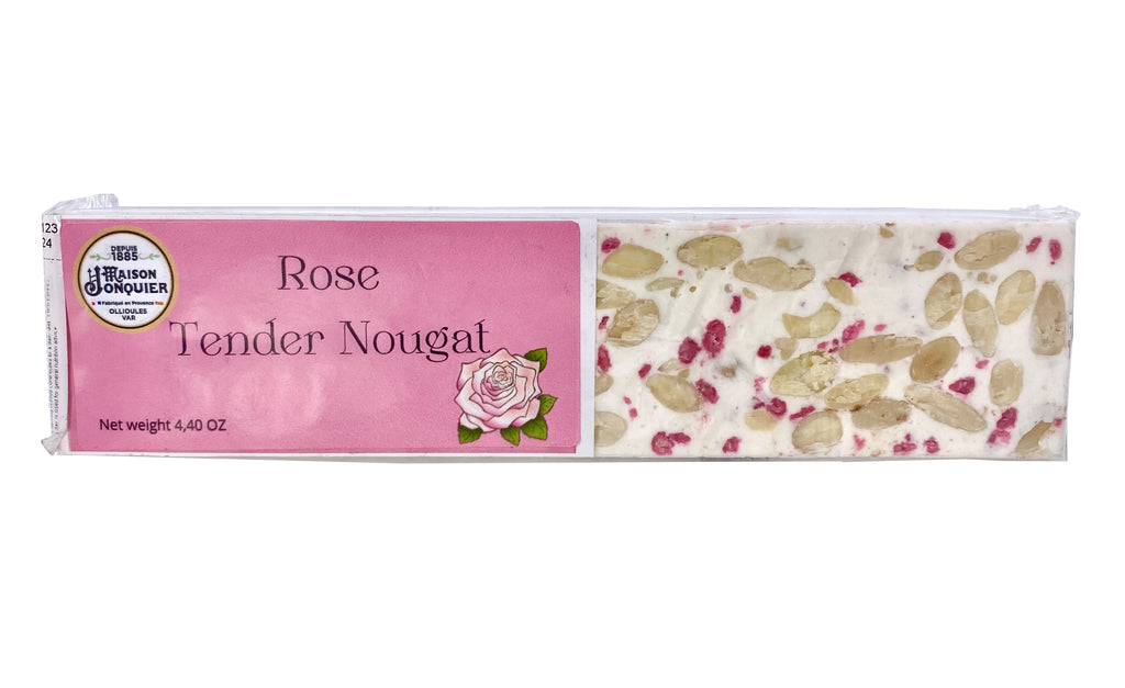 The Jonquier family have been making sweet treats in Ollioules in the South of France since 1885. This delicious rose nougat is made to their original family recipe, handed down through the generations. Sweet, soft, and filled with delicious almons and decadent crystalized rose petals. 4.40z. Made in France.