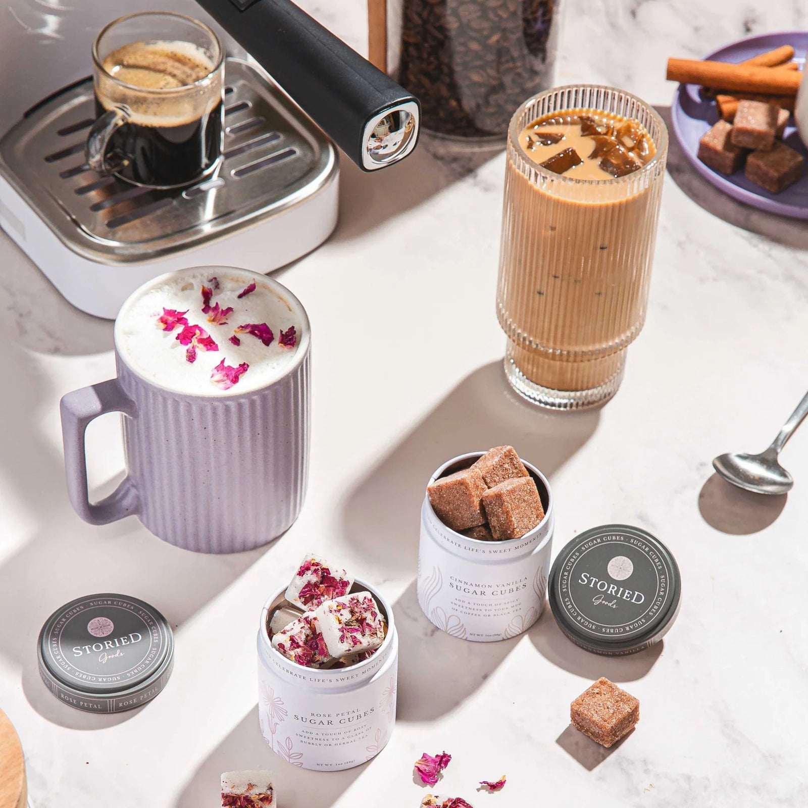 Rose petal sugar cubes with packaging on a white background