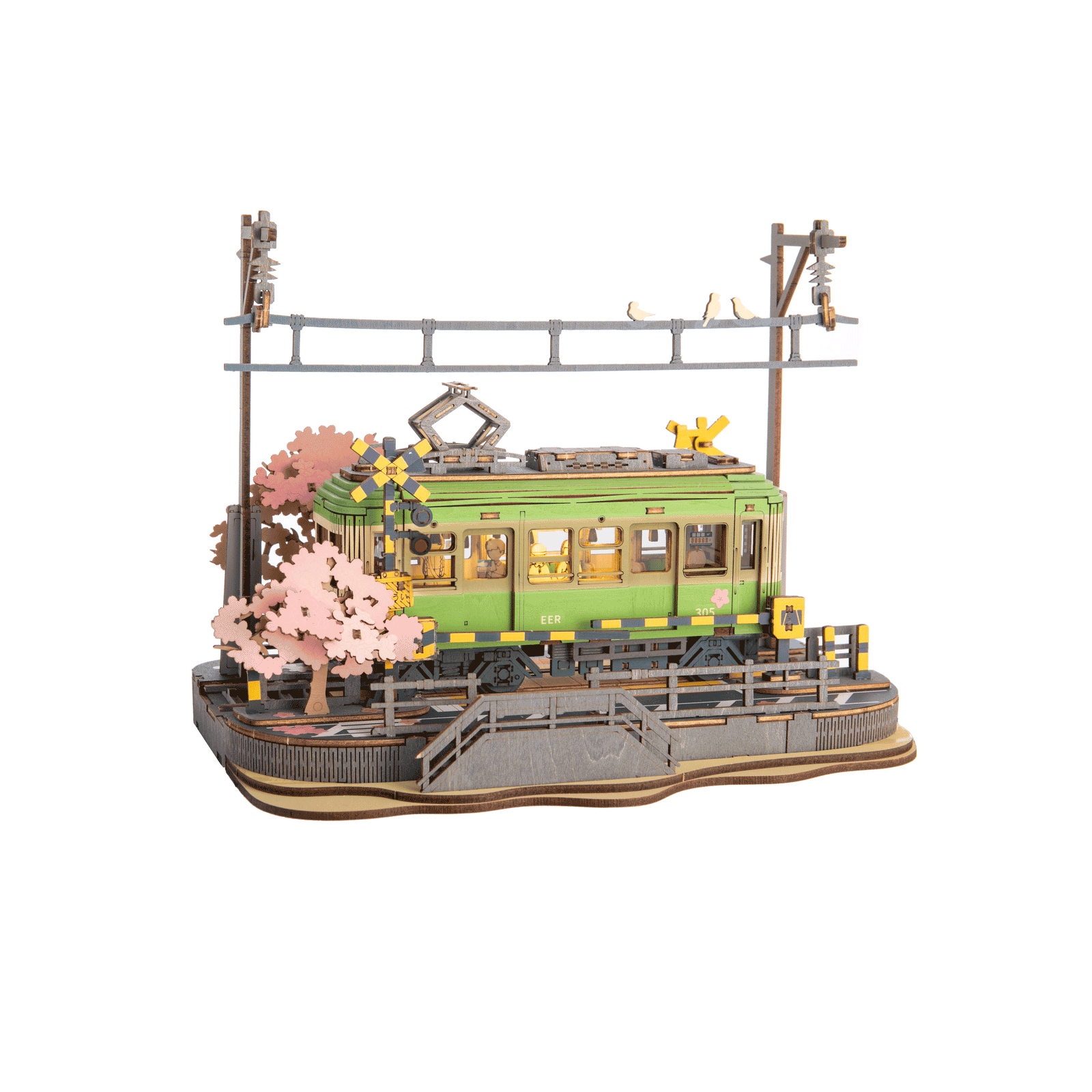 This delightful DIY wooden puzzle features a charming Japanese tram, beautifully set on a track surrounded by blooming Sakura trees.

The tram is filled with miniature wooden passengers, capturing a serene and nostalgic atmosphere on a spring day in Japan. As you assemble this puzzle, you'll bring to life a picturesque scene, where the tram seems to glide gently through a landscape of cherry blossoms, evoking the tranquil beauty of Japanese culture.
