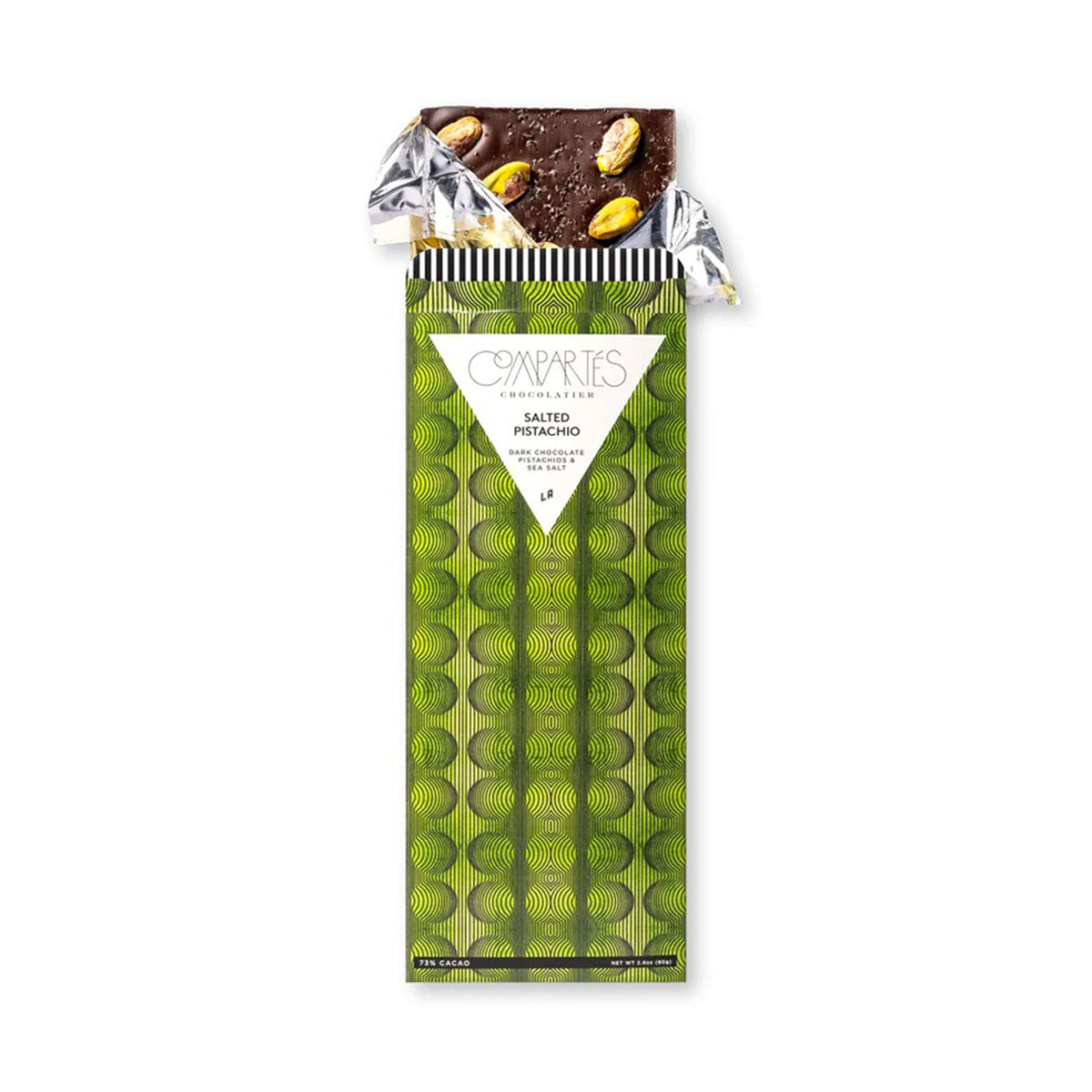 Chocolate bar with pistachios in a green packaging on a white background
