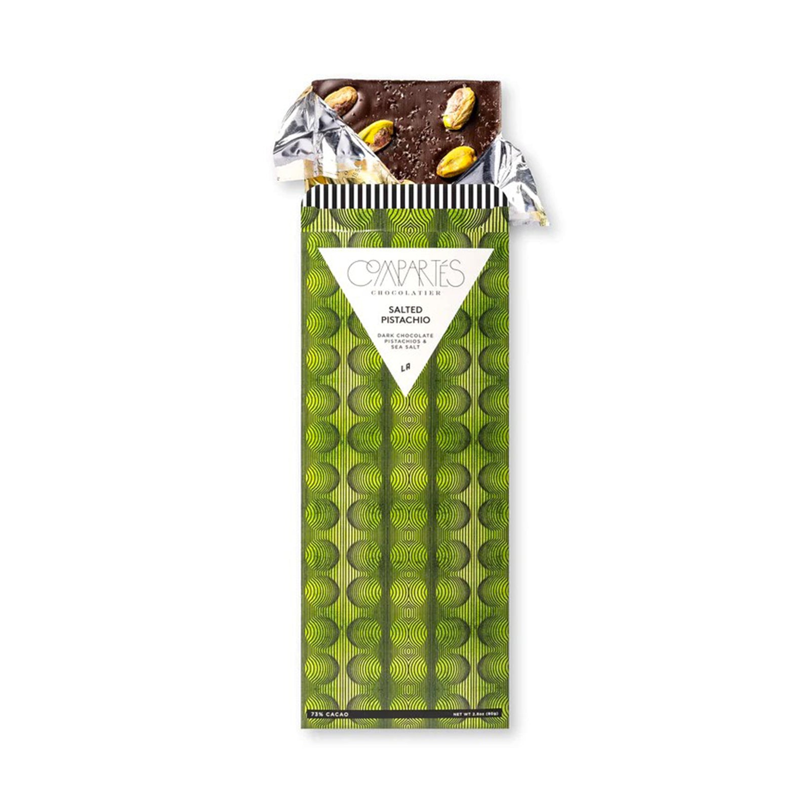 Chocolate bar with pistachios in a green packaging on a white background