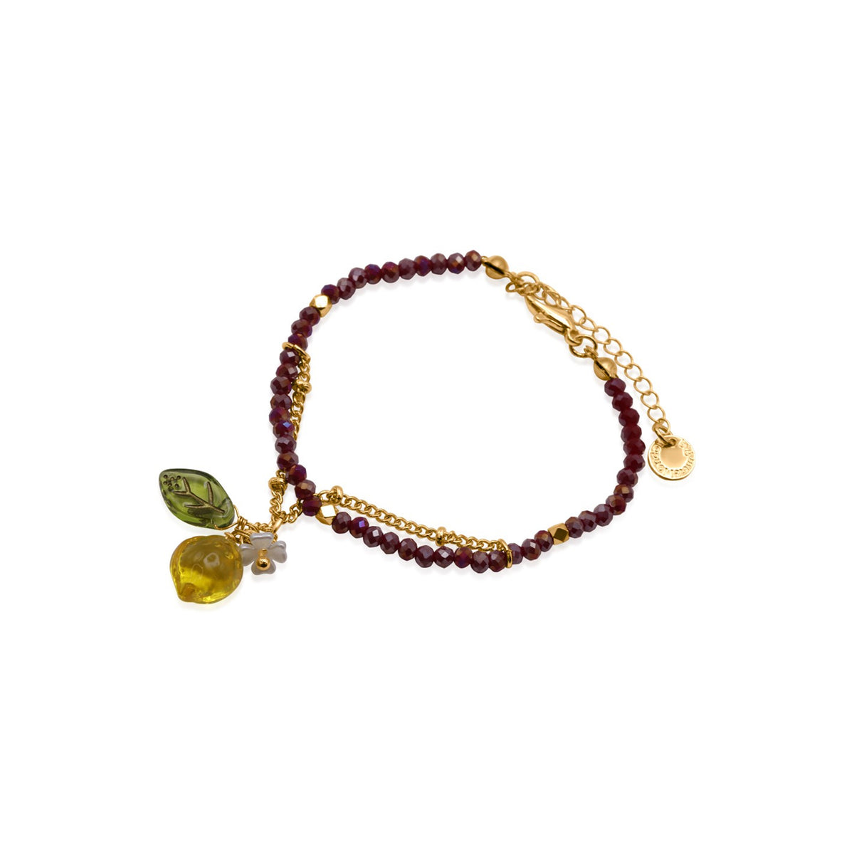 A delicate beaded bracelet with dark red beads, gold-tone chain links, and three dangling charms: a green leaf, a yellow lemon charm, and a small white flower, displayed on a clean white background.