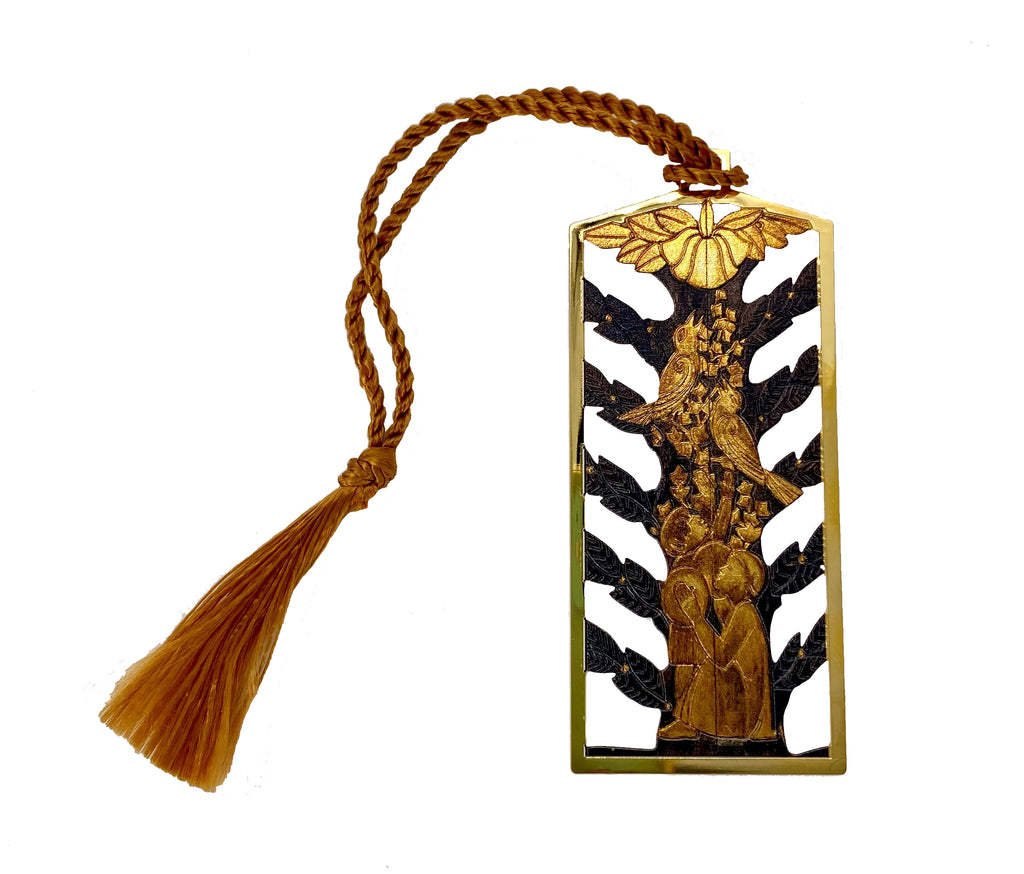 This beautiful bookmark features a reproduction of the centerpiece of an Organ Screen by artist Sargent Claude Johnson (American, 1888 - 1967). Produced by the artist between 1933 - 1943, this intricate artwork was carved from redwood, then gilded and painted to create the stunning finished piece. Metal bookmark with cord tassel Dimensions: 2.75" x 1.25" plus 5.5" cord tassel.