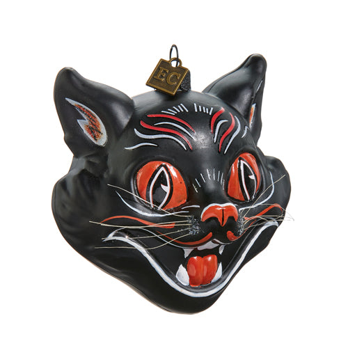 This black cat has had a bit of a surprise! It can't quite believe that it has a reputation as the bringer of back luck! This crazy looking kitty is actually quite sweet, and just wants to make your Halloween decor look absolutely purr-fect. Glass ornament Hand painted features and nylon 'whiskers'.  4" x 3" x 3.5".