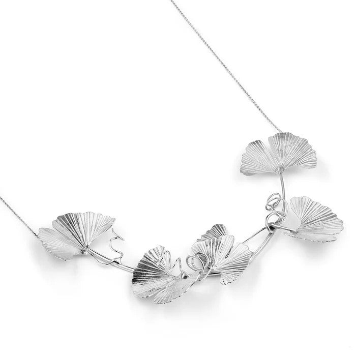 This exquisite Ginkgo sterling silver necklace is a true testament to craftsmanship and elegance. Meticulously handcrafted, wearably lightweight. Elevate your style with the timeless beauty of this collar, making a bold and sophisticated statement. Materials: Sterling silver Dimensions: Length, approx. 18".