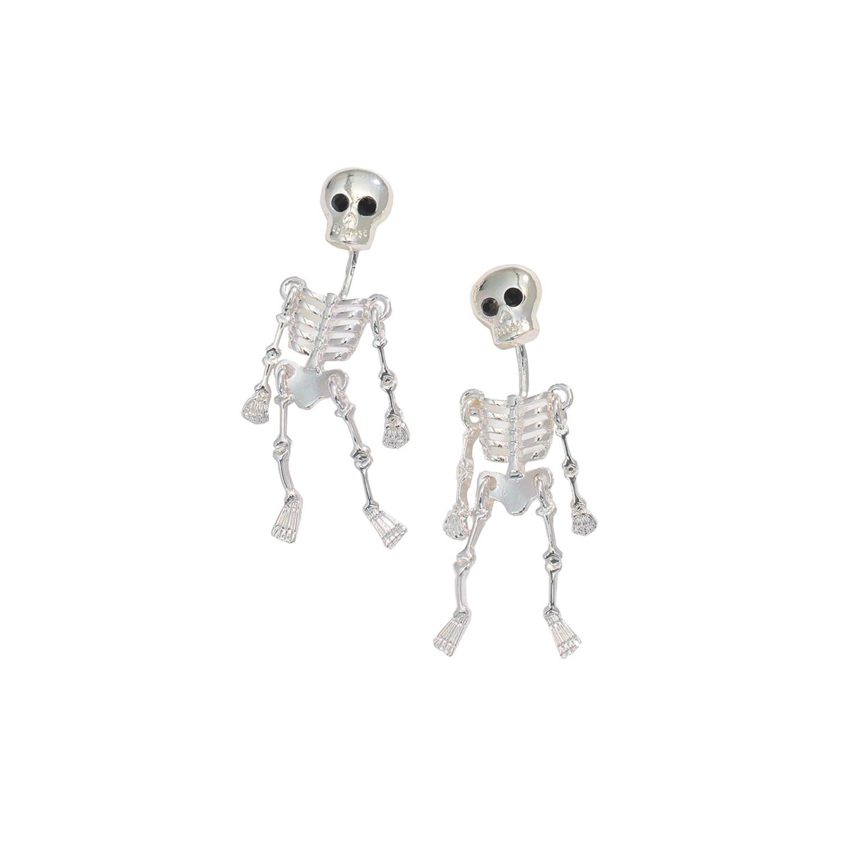 A pair of silver skeleton stud earrings with black eye sockets and small dangling charms, shown on a plain white background.