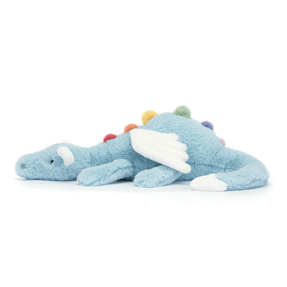 Prepare to be dazzled as Sky Dragon comes in to land! This magical friend has a long sky-blue body and soft rainbow spines from back to tail! With a cuddly snout, bobble nostrils and cloud-white wings, ears and tail dart, this sleepy dragon is an absolute dream. Dimensions: 4.7in x 5.5in x 19.7in. Suitable from birth.