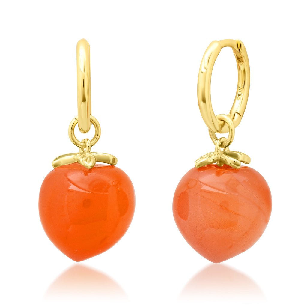 Always look just peachy when you wear these cute gold huggie earrings, which are topped off with the cutest peach charm. Made from 14k gold plated sterling silver, with peach-colored agate, these sweet earrings are sure to brighten up even the dullest day! Sterling silver, 14k gold vermeil, agate, enamel. 0.75" x 0.45"