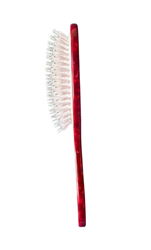 This delightful hairbrush is made of individually cut and formed eco-friendly cellulose acetate, and the snake design is individually hand painted.