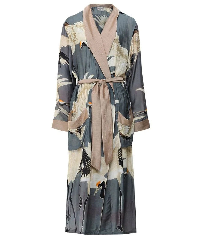 This soft, lightweight gown is complete with a fold over collar, two patch pockets at the front and a beautifully distinctive all-over vintage style Heron print. Wear yours around the house with your favorite loungewear, or team with skinny jeans and a basic tee for a chic, casual look.  50% modal, 50% viscose ONE SIZE