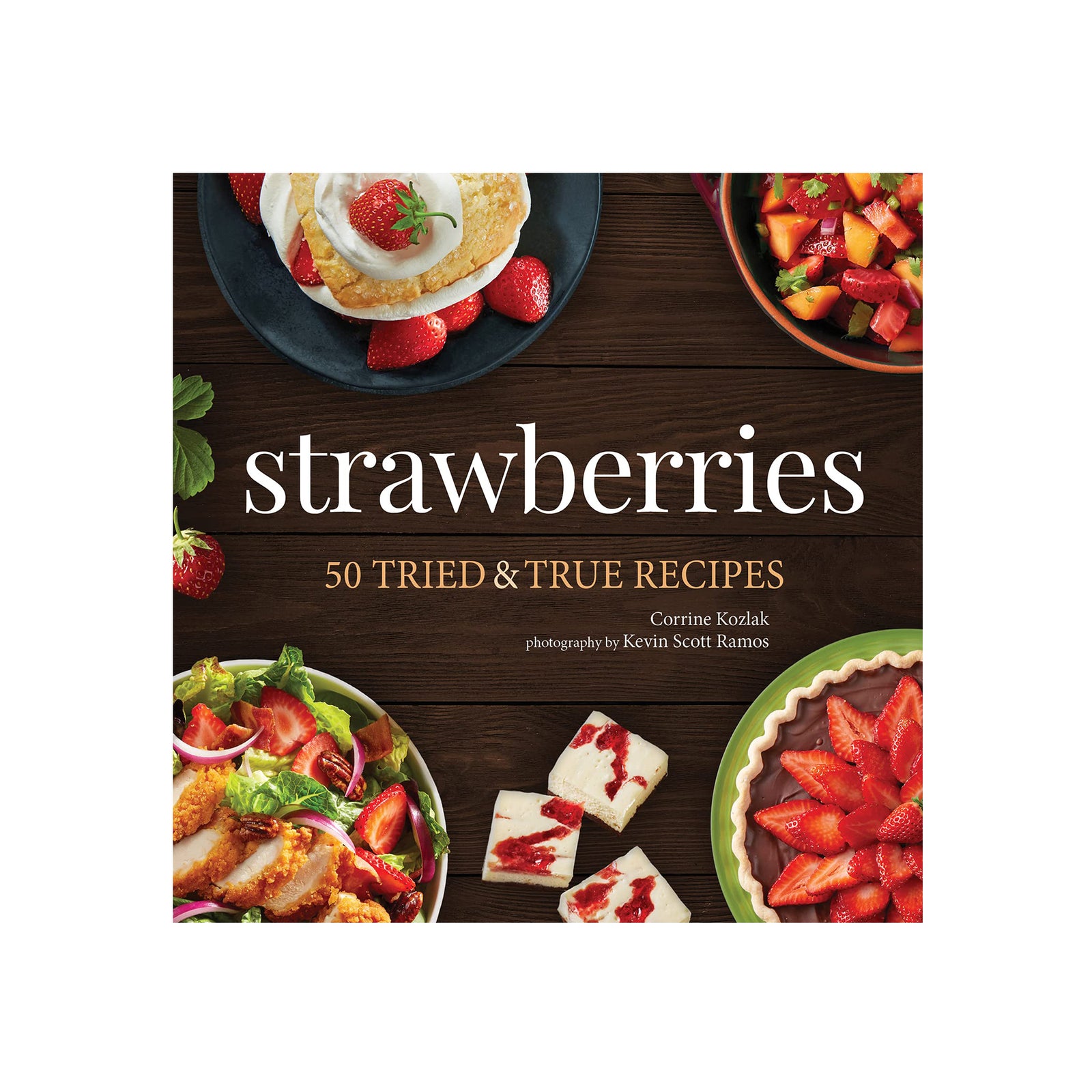 Book cover of 'Strawberries: 50 Tried & True Recipes' with images of strawberry dishes on a wooden background.
