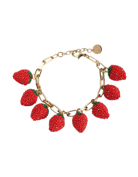 This delightful bracelet by jewelry designer Olivia Dar, features hand-beaded strawberry charms on a gold-plated chain. This beautiful statement piece will add a fun, sweet & summery touch to any outfit. Handmade 3D Beaded strawberry charms on a gold-plated chain. Chain length: 6" plus 1 1/4" extender.
