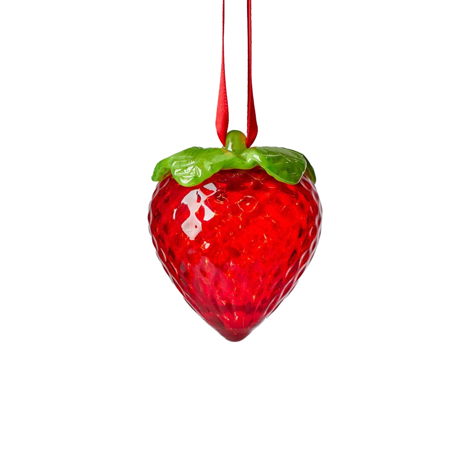 This truly unique piece of art will add shine to your favorite window or a pop of color to your holiday decor. This sweet strawberry ornament is perfect for year-round decor and makes a great gift. This beautiful berry is painstakingly hand-blown, one by one, in an artisanal glass workshop in Philadelphia. Handmade in the USA Material: Glass Dimensions: 2" x 1.5"