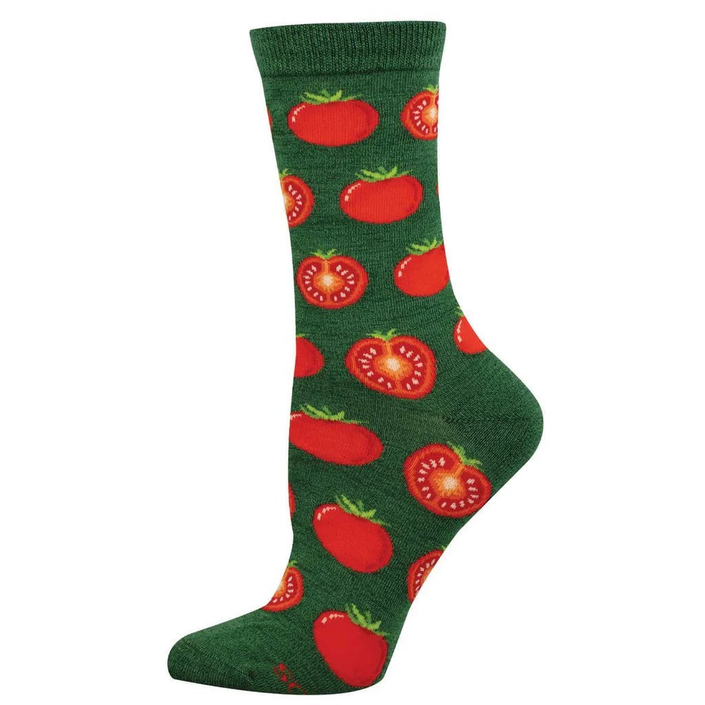 Green sock with red tomato pattern on a white background