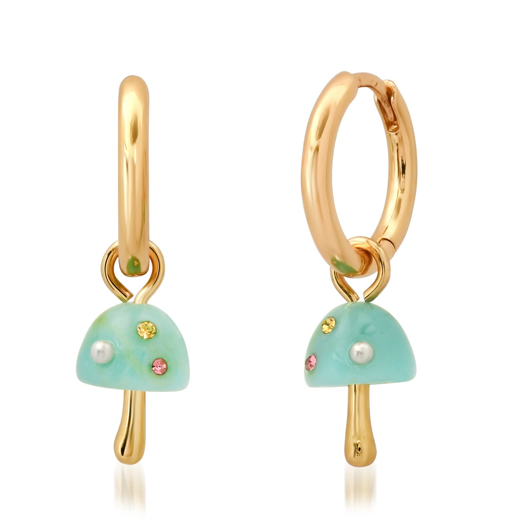 These cute huggie hoop earrings won't take up mush-room in your jewelry box, but they will certainly brighten it up! The pretty aqua blue mushrooms are studded with teeny tiny colored crystals and pearls, and they dangle daintily from gold-plated hoops. Materials: Gold plated brass, crystal. Dimensions: 0.80" x 0.5".