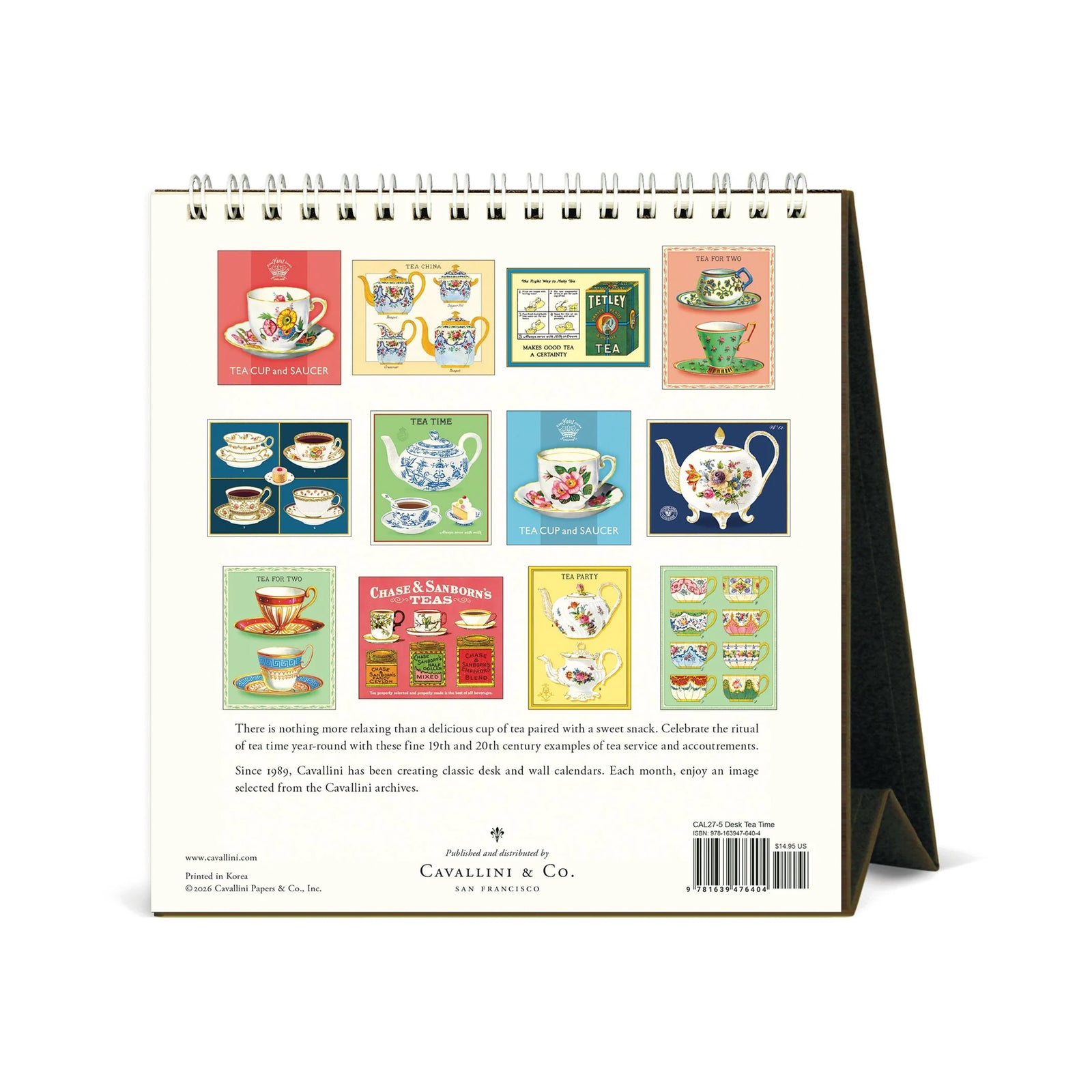 A spiral-bound 2027 desk calendar titled 'TEA TIME' shown standing on its black easel stand against a white background. The cover features a vintage blue-and-white teapot and cup illustration on a light green panel.