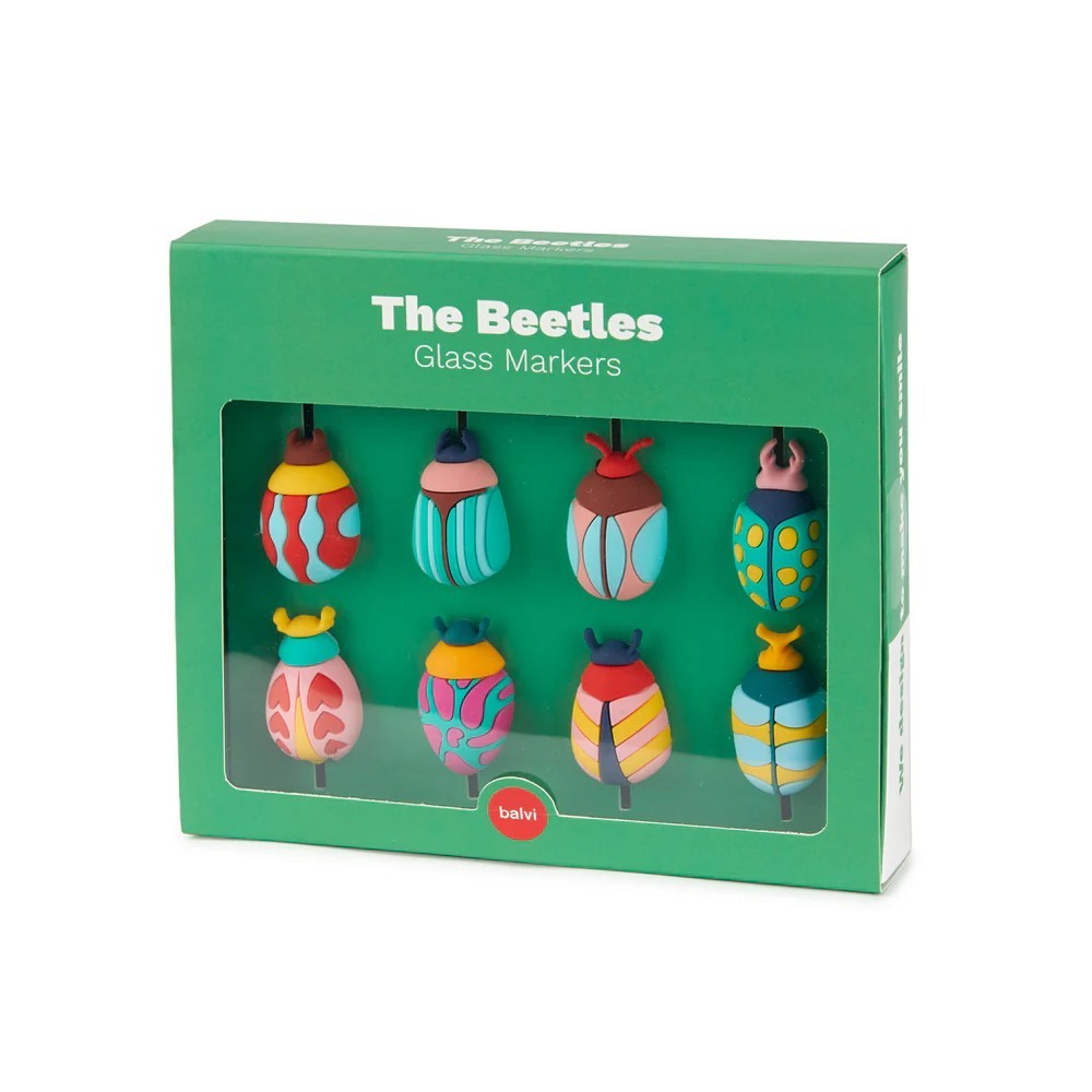 Box of colorful glass markers shaped like beetles on a white background