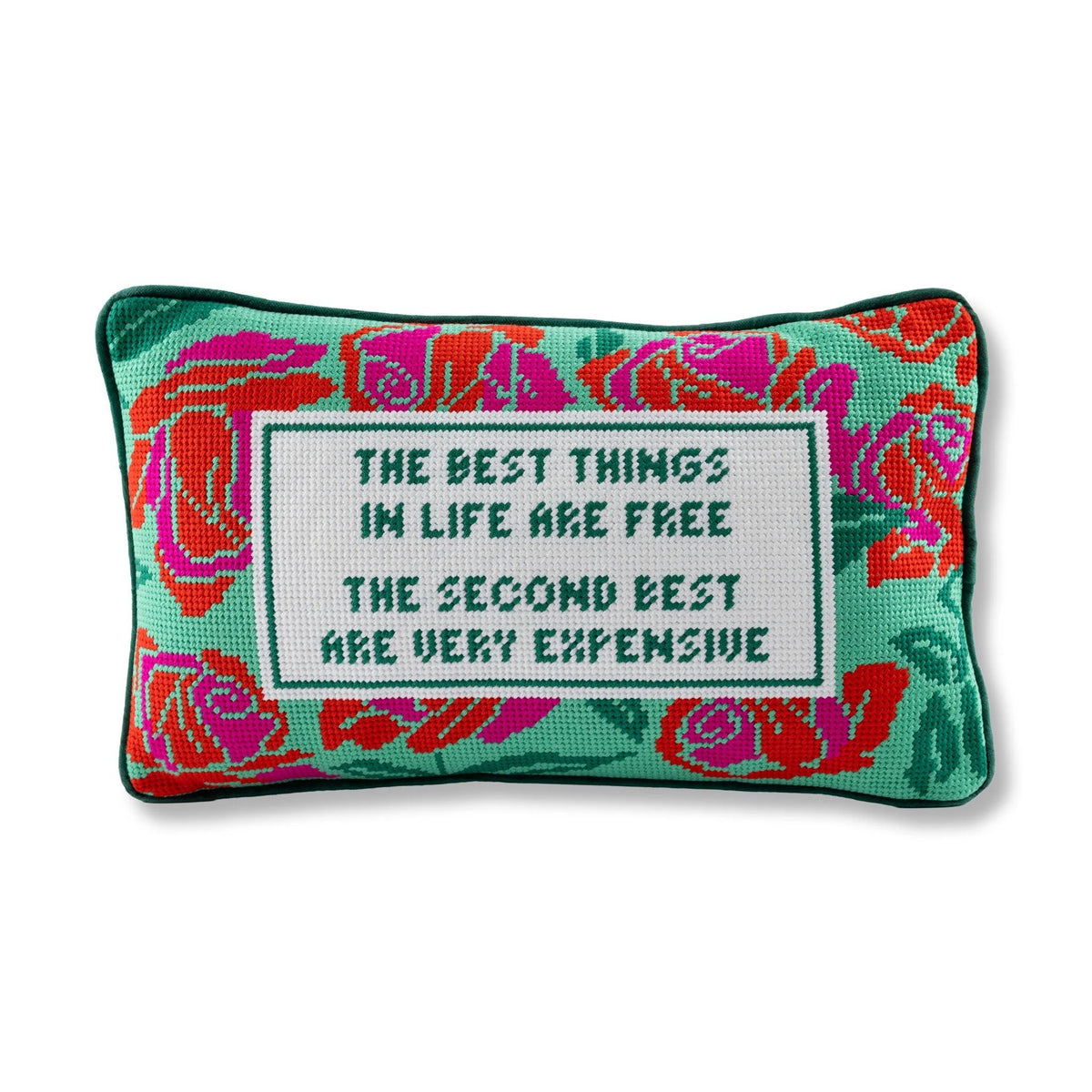 Decorative pillow with floral pattern and text on a white background