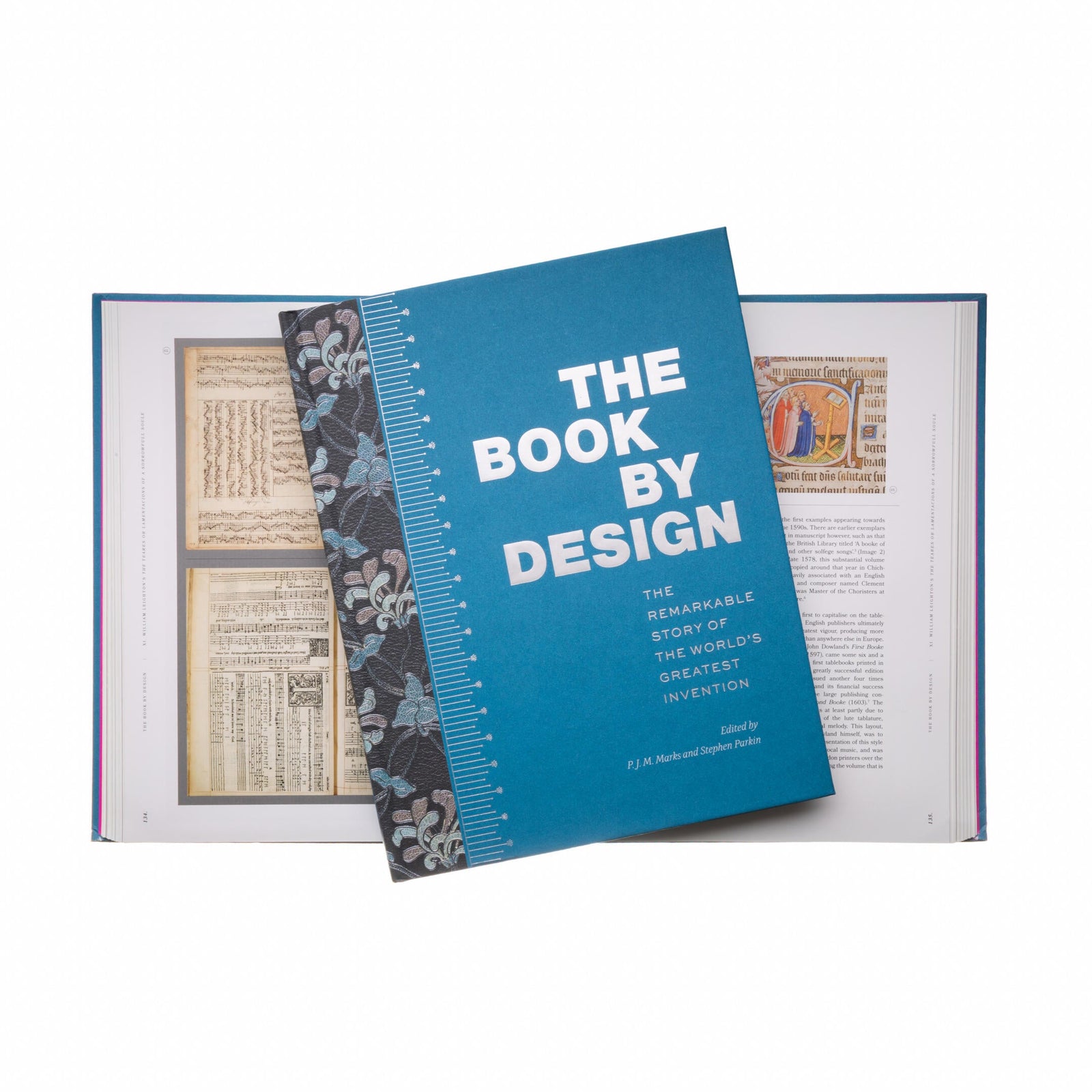 Book titled 'The Book by Design' with a blue cover and white text, open to reveal interior pages.