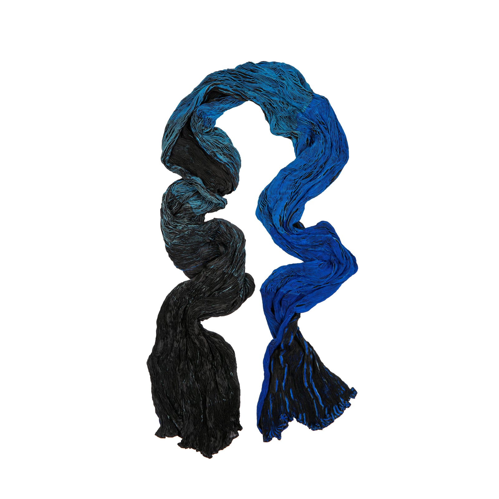 This striking silk scarf is made using the shibori dyeing technique. The word shibori means “to wring, squeeze, and press,” referring to the traditional, manual Japanese dyeing technique. This technique produces multitone patterns on fabric and is similar to yet more intricate than tie-dyeing. 100% silk scarf Shibori dyed, so each scarf is unique (scarves may vary slightly from the photos) Dimensions: 78.5" x 27.5"