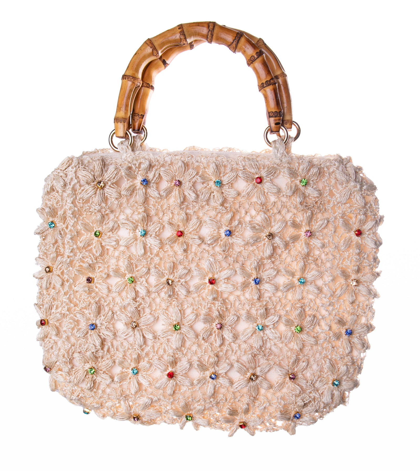 From luxury handbag brand, Serpui, comes this summer-fresh tote.  Made from hand-crocheted natural straw, the center of each flower on the front side of the purse is accented by a sparkling crystal rhinestone.  The purse is elegantly finished with bamboo handles and is fully lined with an interior pocket. 16" x 12".