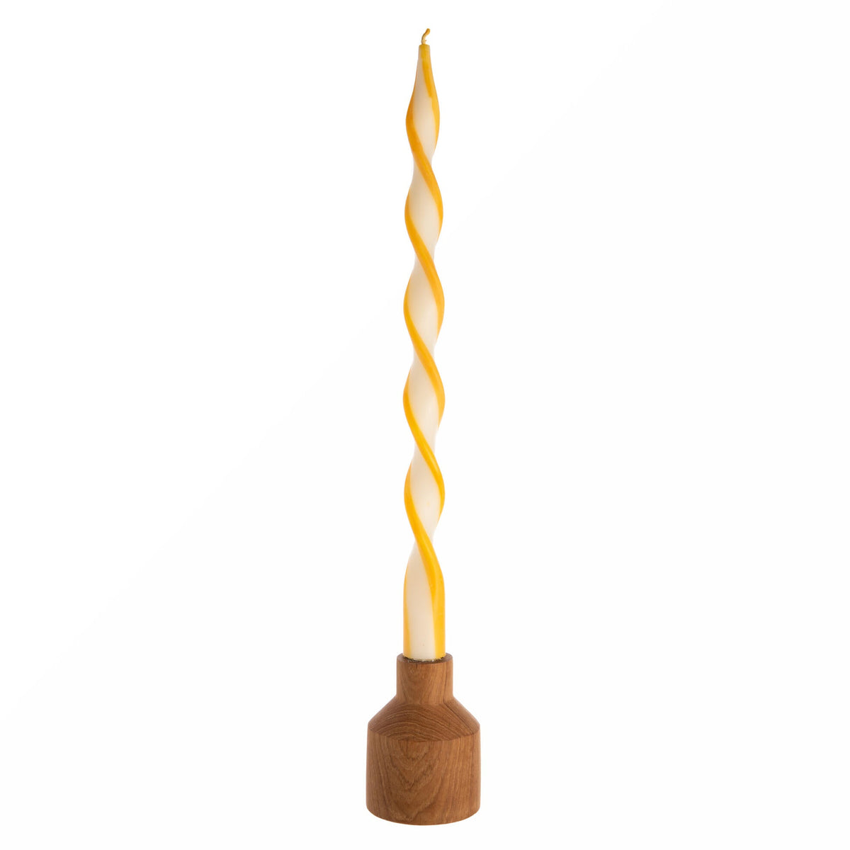 Tapered candle with a wooden base on a white background