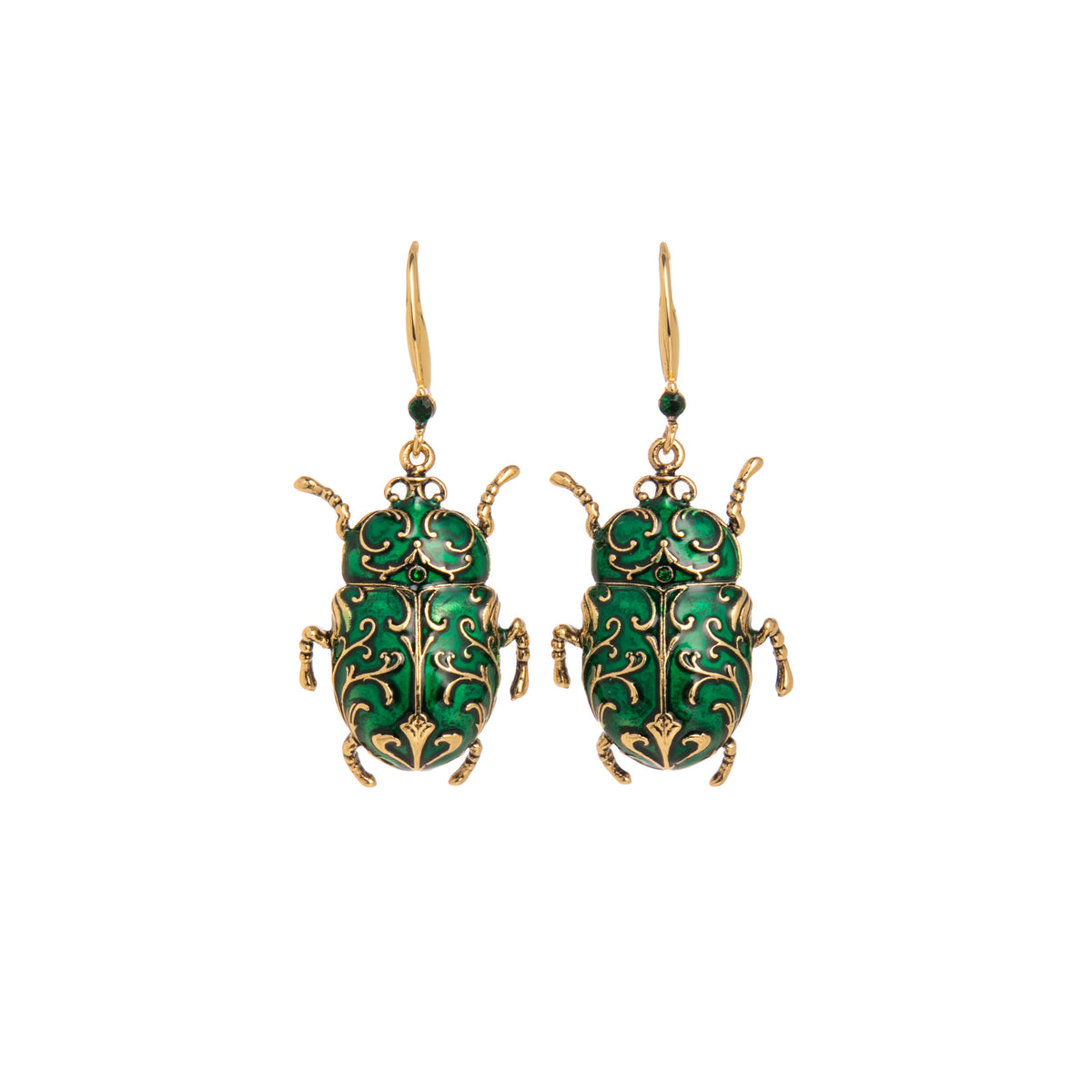 Earrings shaped like scarab beetles in gold with green enamel on a white background.