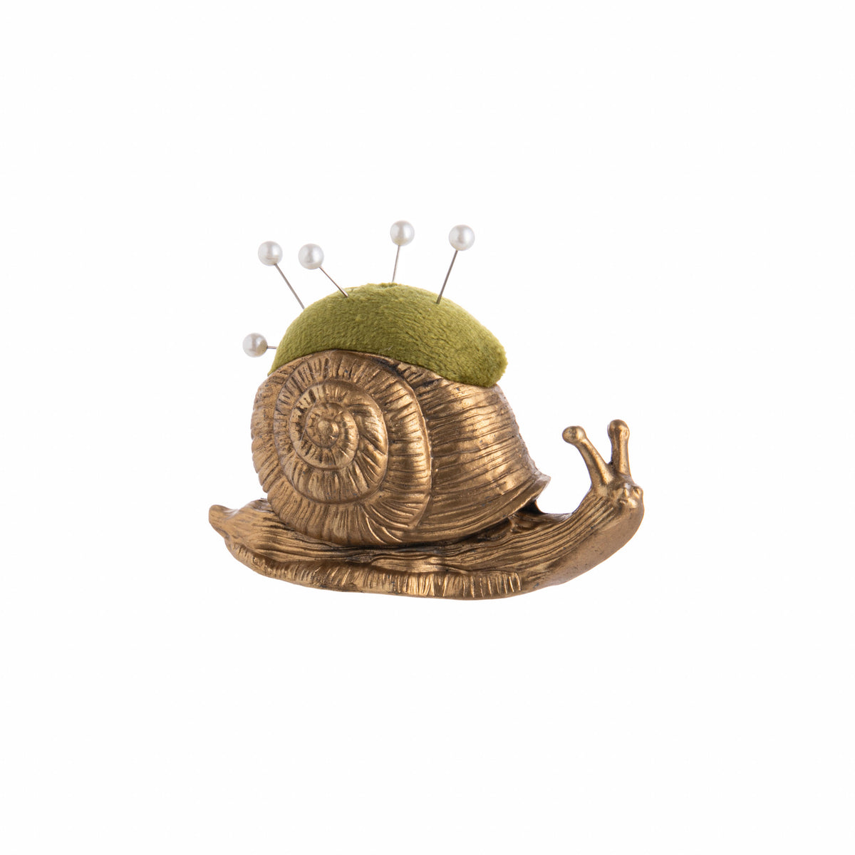 Snail-shaped pin cushion with green top and gold body on a white background
