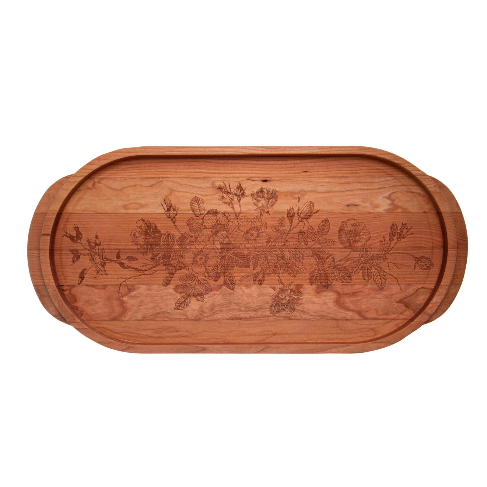 Wooden cutting board with floral patterns on a white background