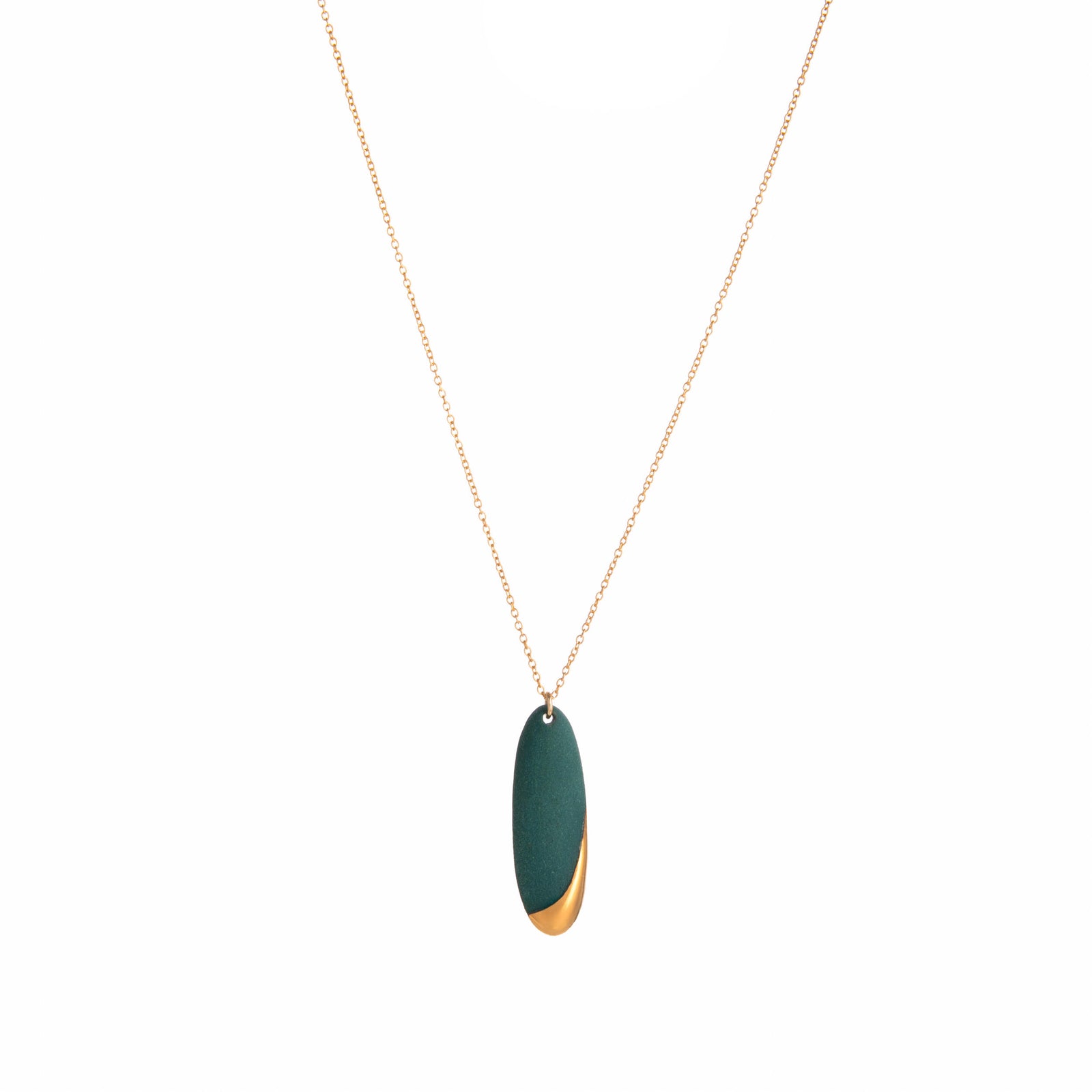 Necklace with a black and gold pendant on a white background