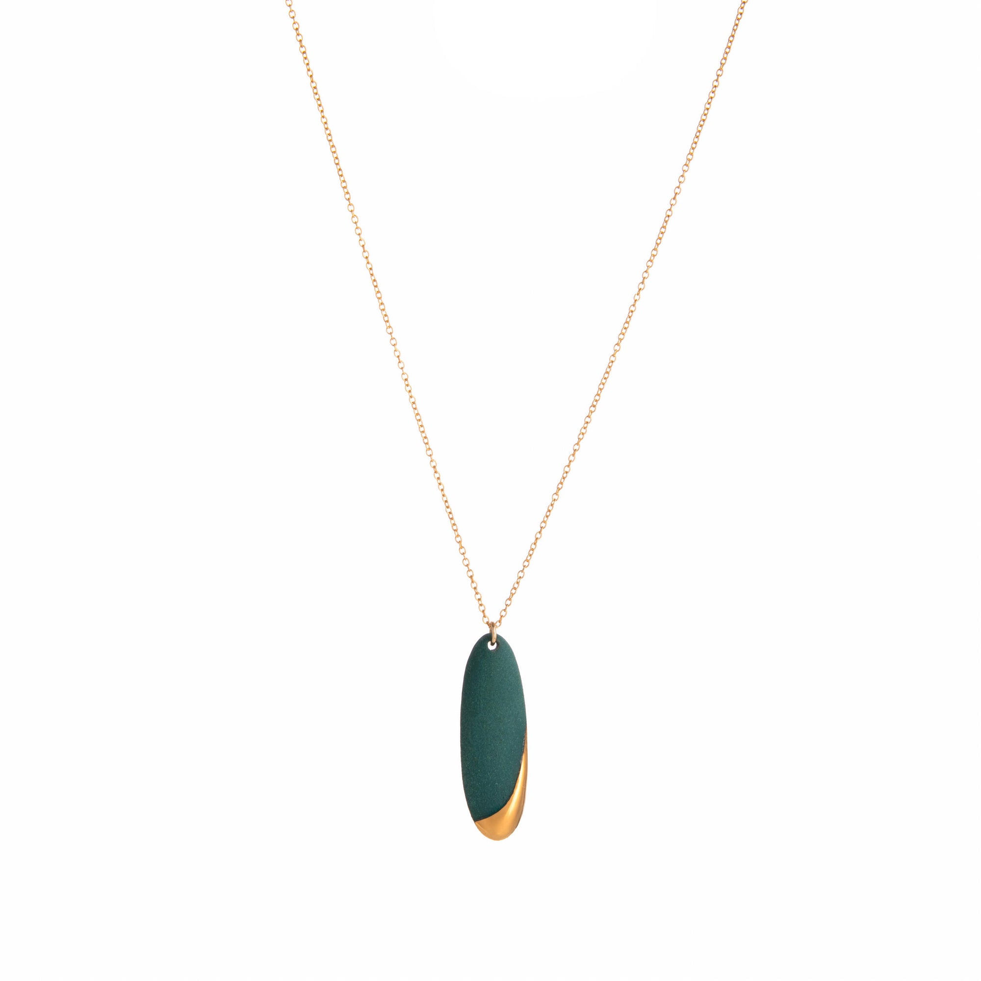 Necklace with a black and gold pendant on a white background